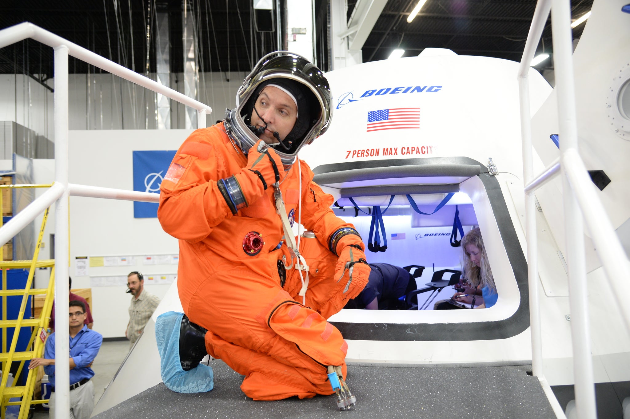 NASA astronaut Randy Bresnik prepares to enter the CST-100 spacecraft, which was built inside The Boeing Company's Houston Product Support Center.
Image Credit: NASA/Robert Markowitz