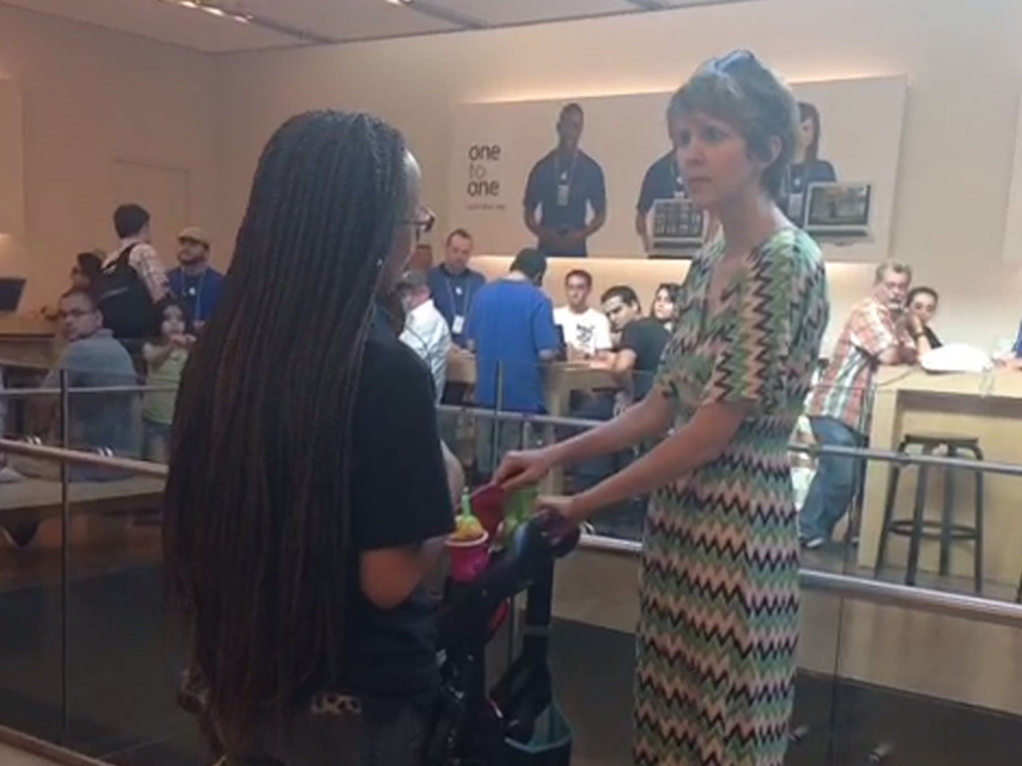 A woman loses her temper after being told she will need need to book an appointment to get parts for her Apple product