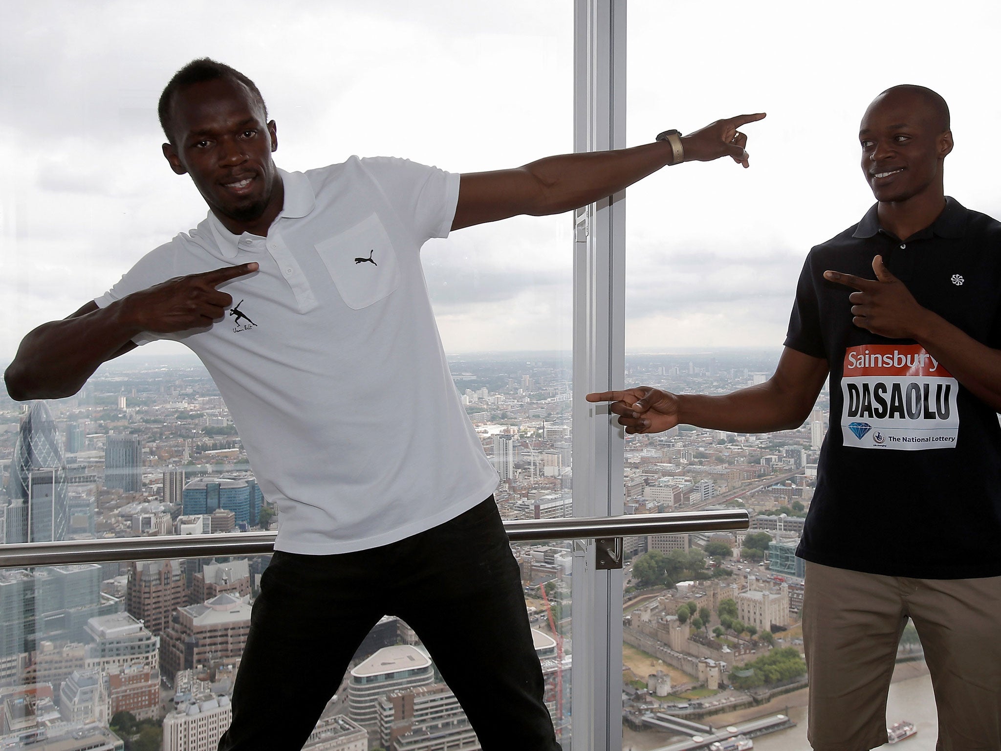 Usain Bolt (left) and James Dasaolu visit the Shard in London