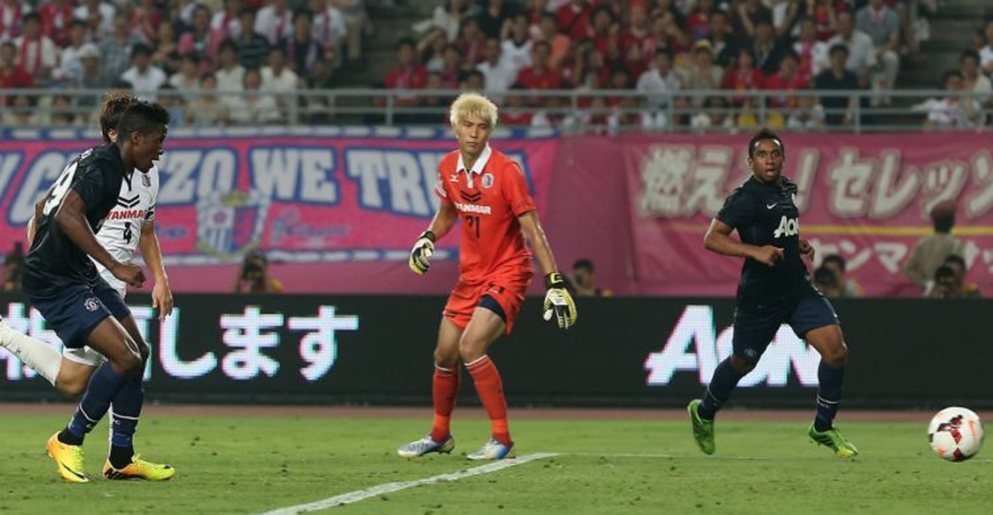 Manchester United’s Wilfried Zaha (left) scores their late equaliser