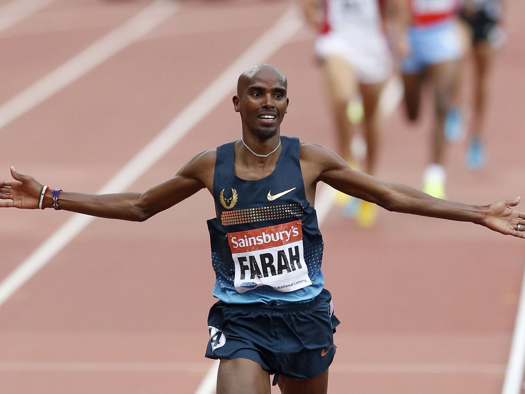 Mobot madness: Mo Farah wins the 3,000m after bursting clear to reward fans