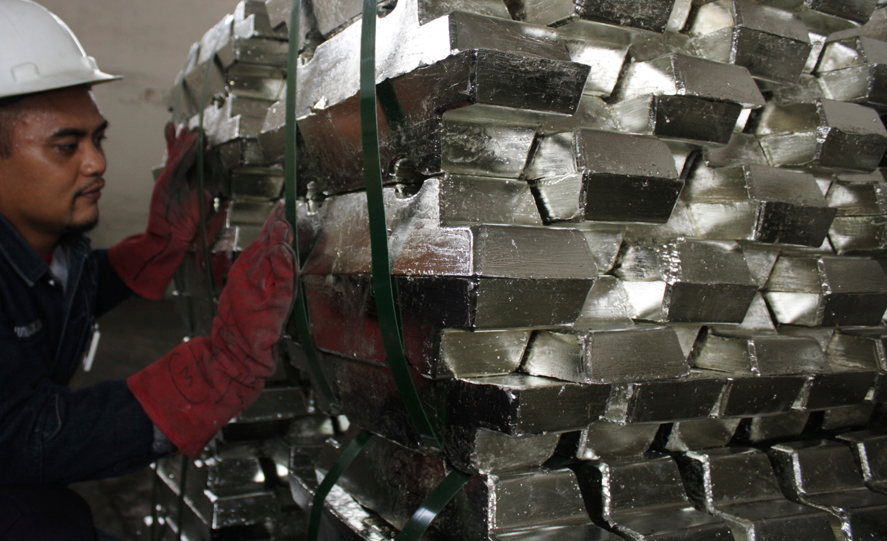 January 24, 2012A worker makes a final check of refined tin ahead of shipment in a warehouse owned by a private company in Indonesia's Bangka-Belitung province January 16, 2012. REUTERS/Dwi Sadmoko