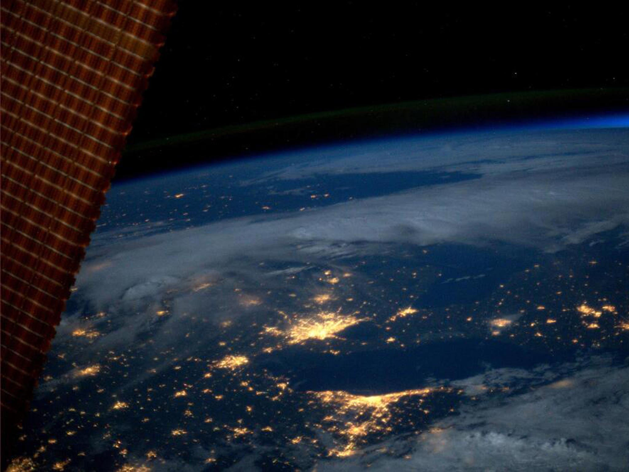 An image of Detroit, Cleveland, Toronto and a blue hint of sunrise