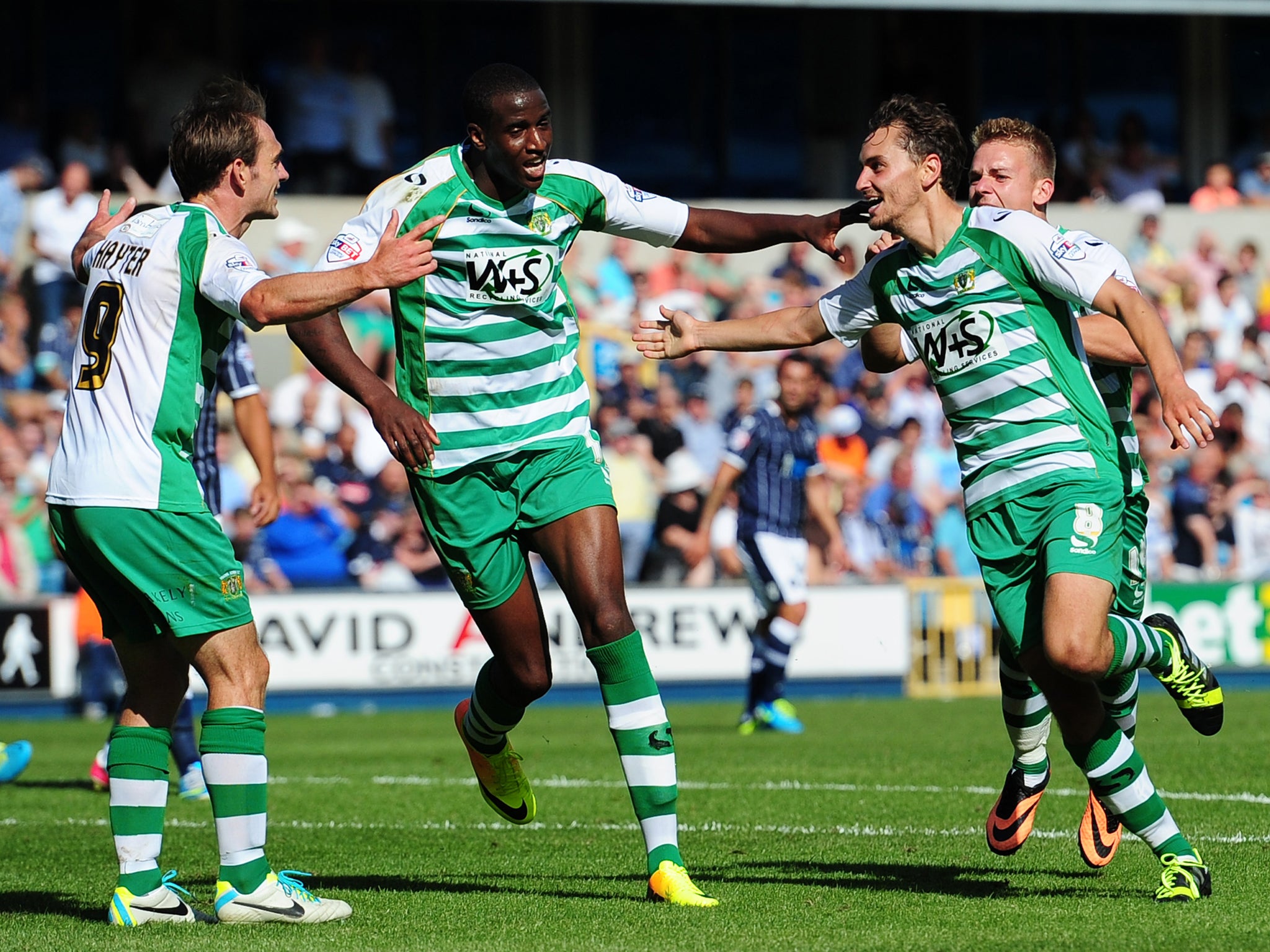 Ed Upson celebrates his goal for Yeovil