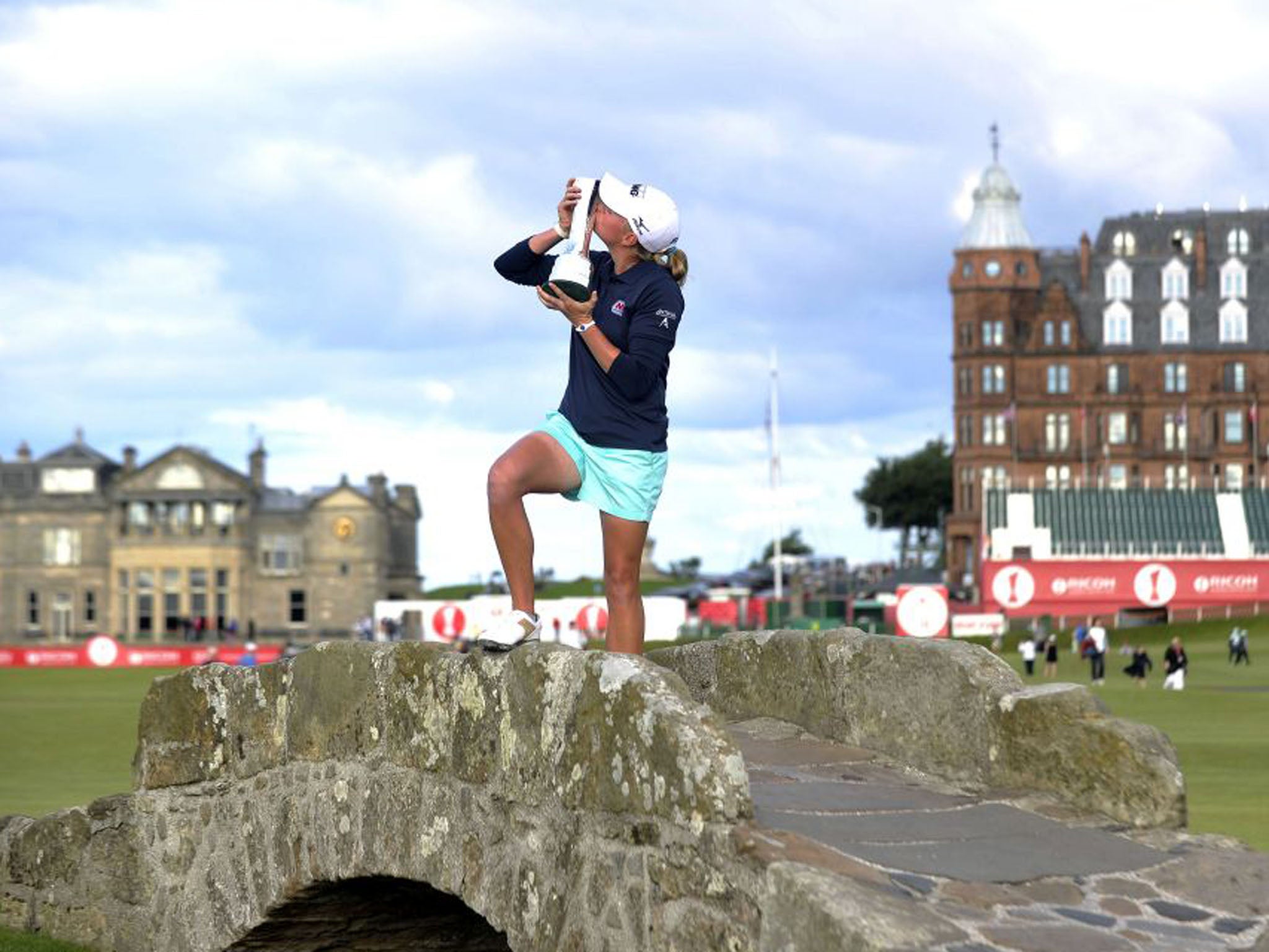 Stacy Lewis celebrates with the Women's British Open trophy following her two-shot victory