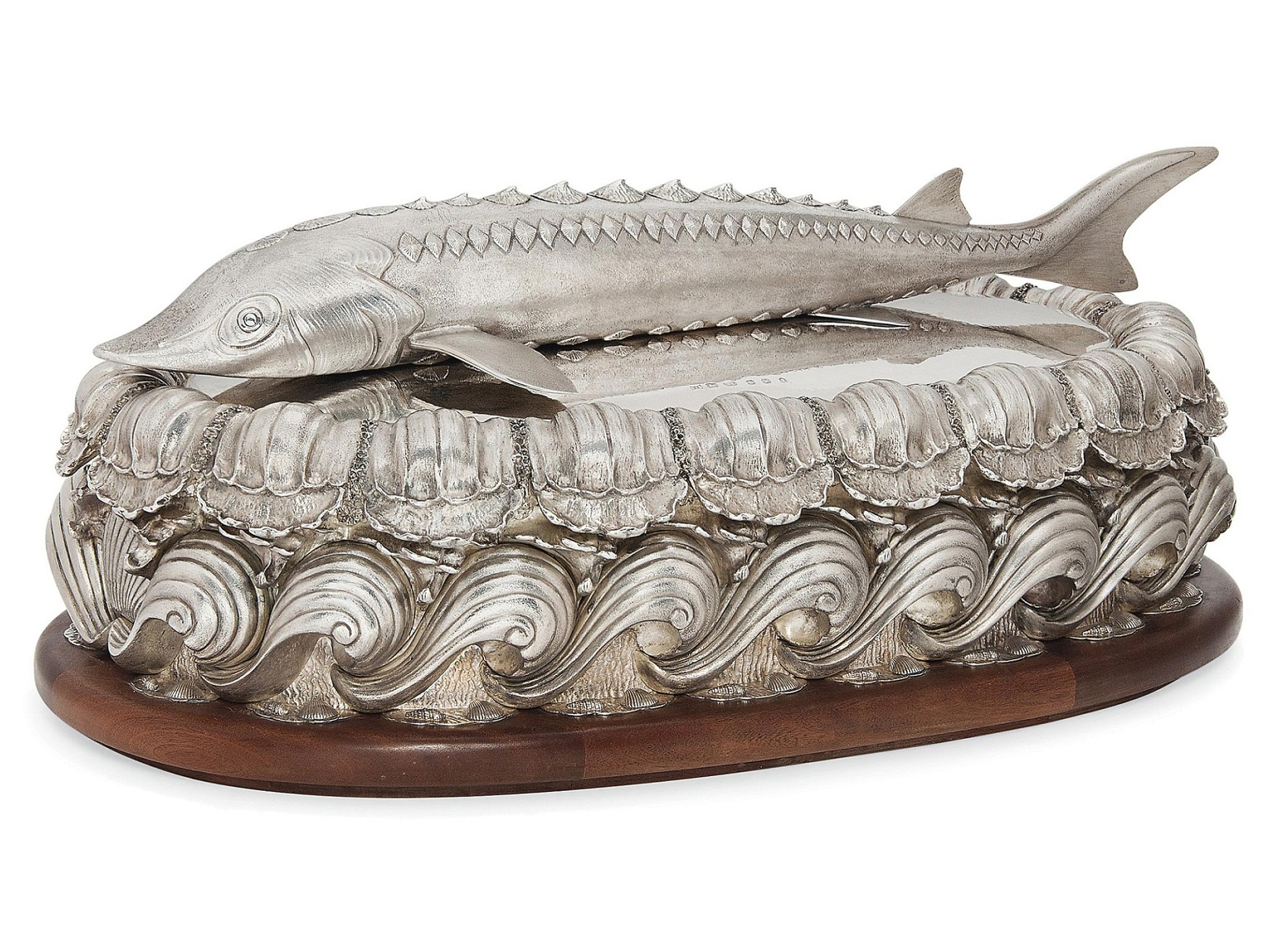 A large silver caviar dish