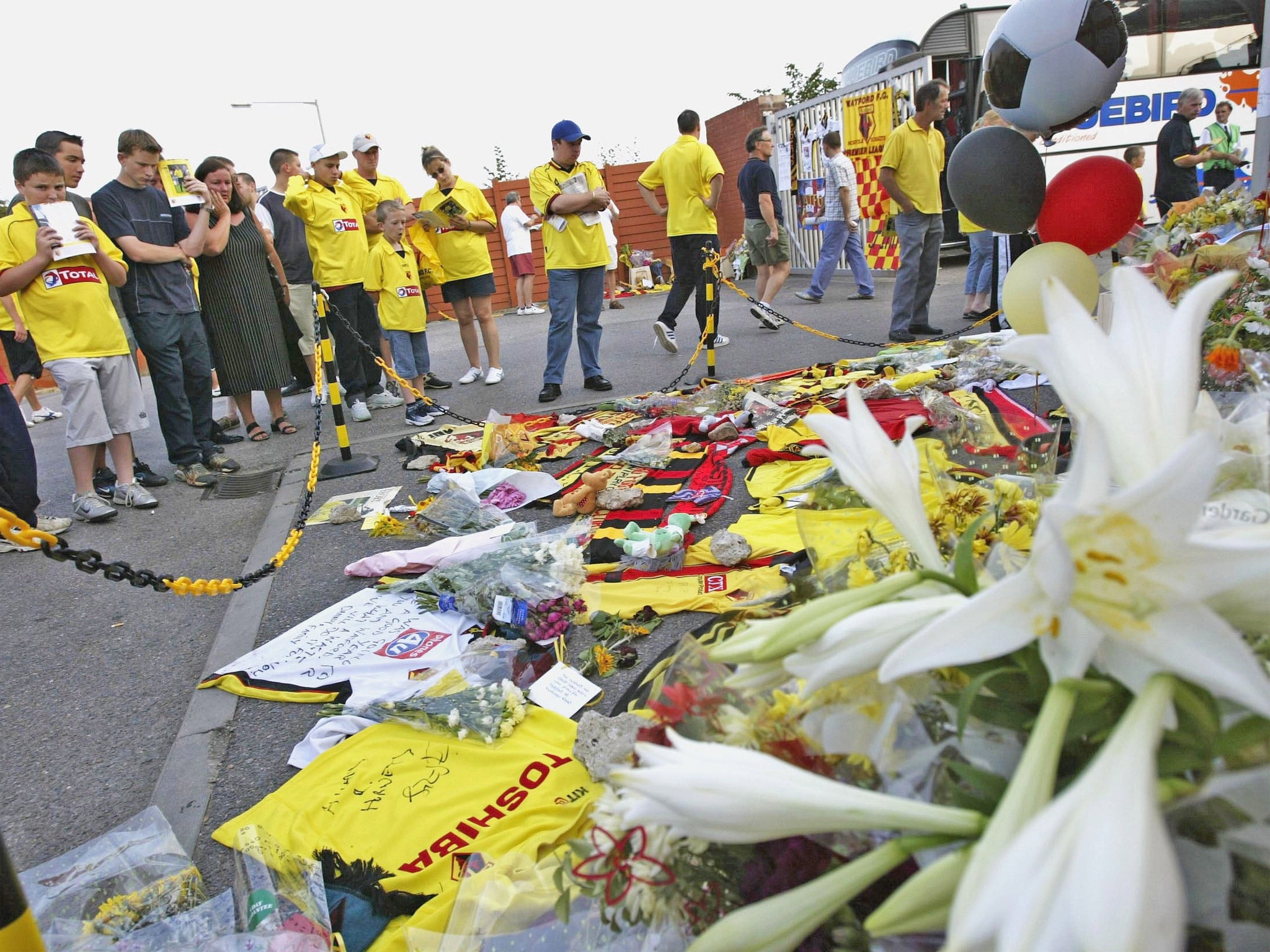 Flowers outside Vicarage Road shortly after Davis's death (Getty)