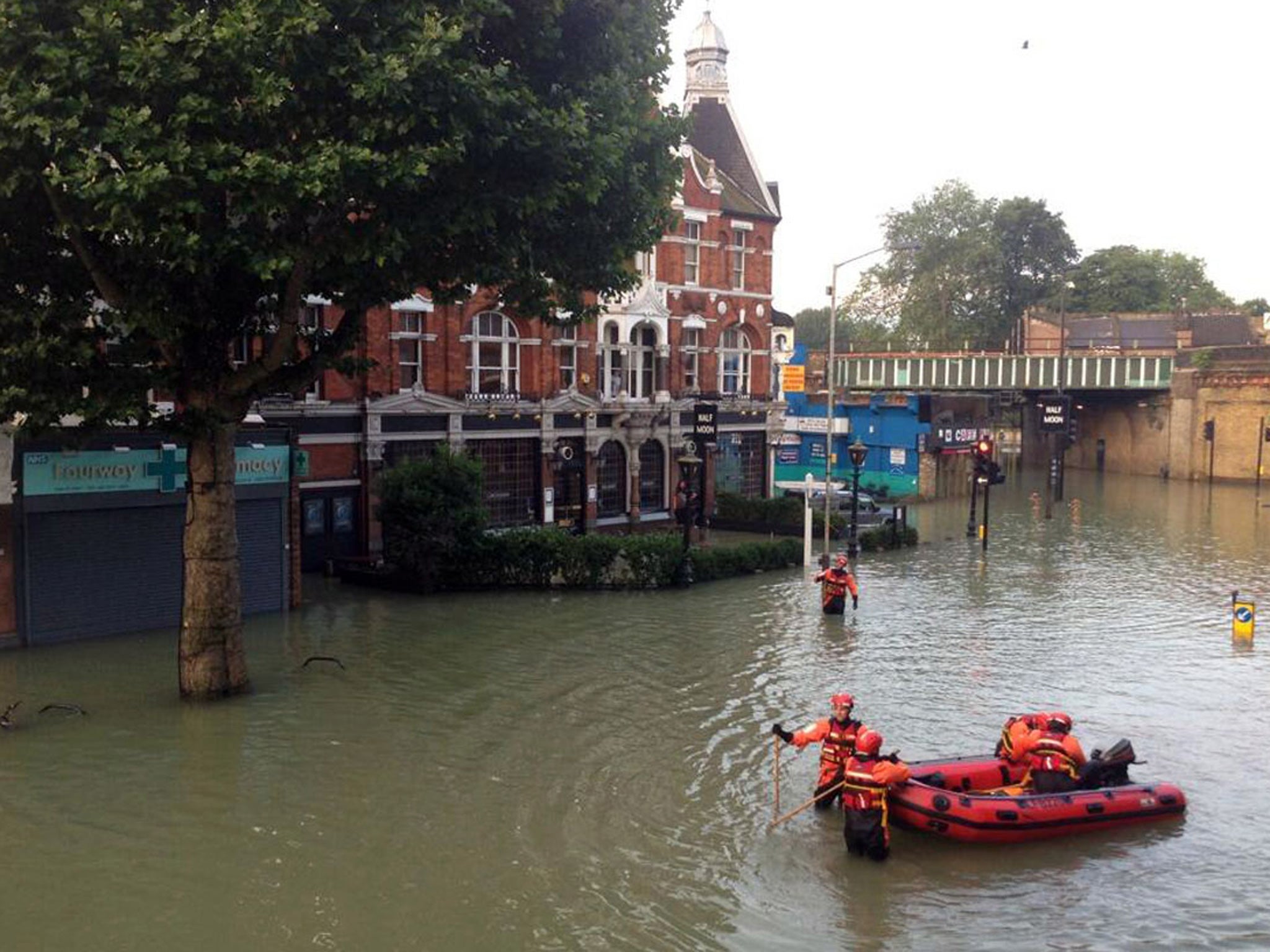 Flooded streets after burst water main in Herne Hill