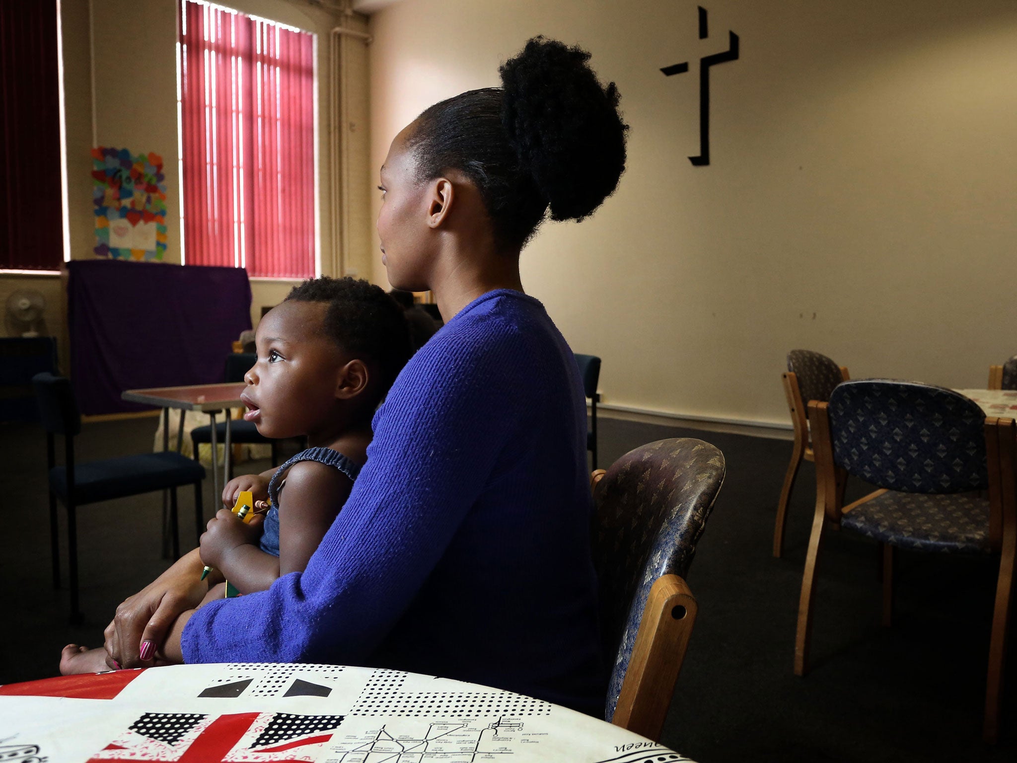 Food bank recipient 'Brenda' and her one-year-old daughter Mercedes are pictured in the Tower Hamlets food bank Poplar branch