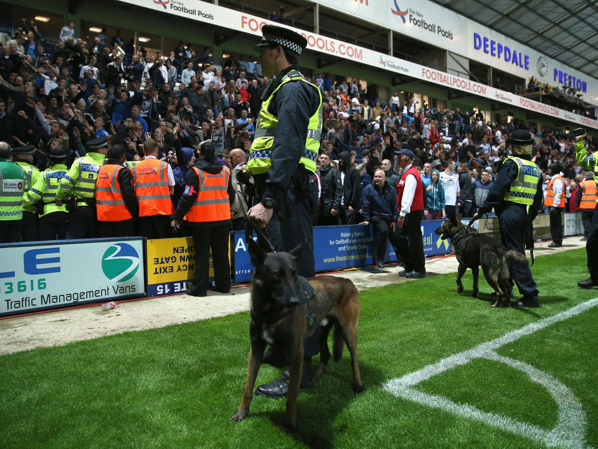 Mounted police try to restore order at Deepdale on Monday night