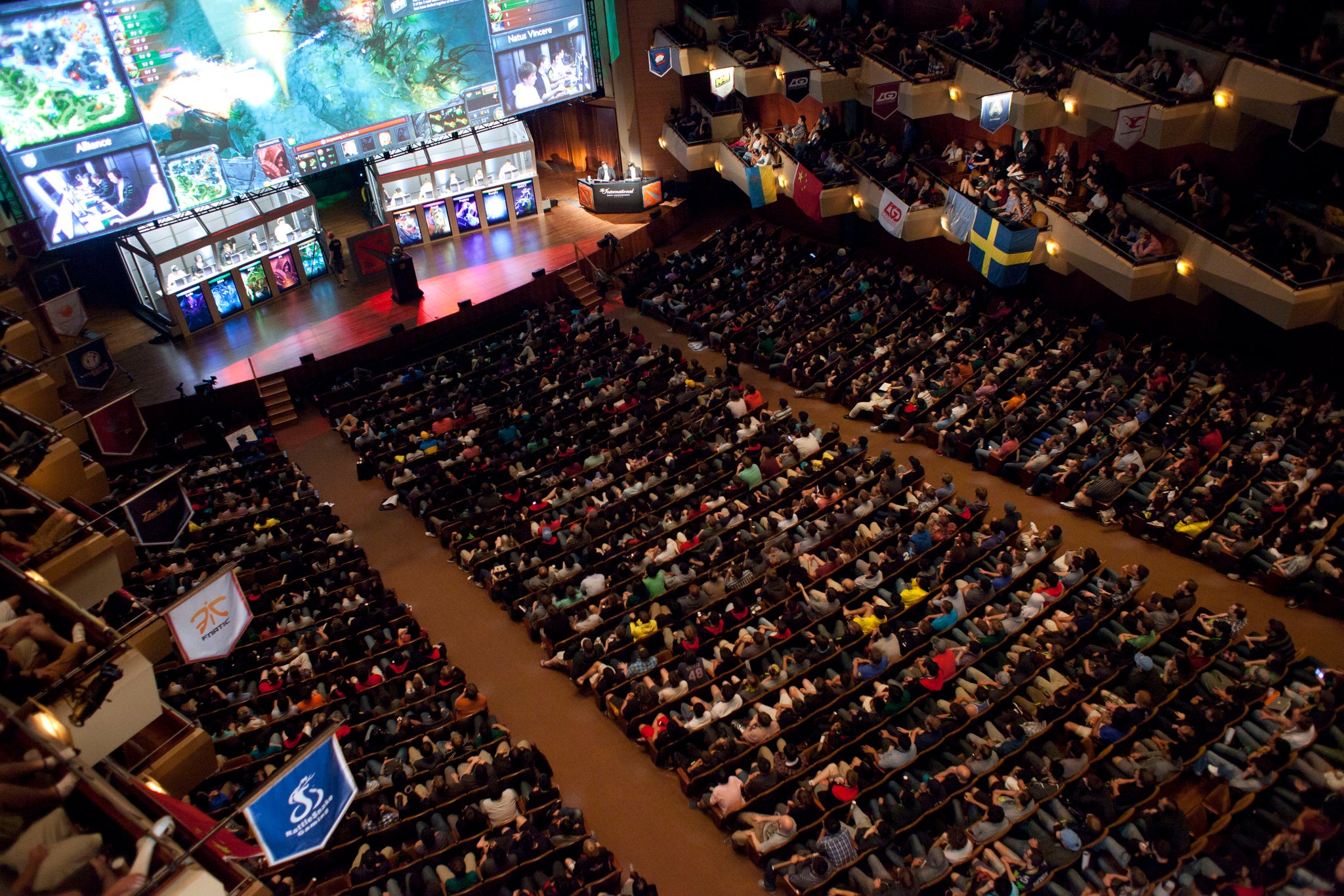 A packed Benaroya Hall watches "The Alliance" battle "Natus Vincere" during "The International" Dota 2 video game competition in Seattle, Washington August 11, 2013. REUTERS/David Ryder