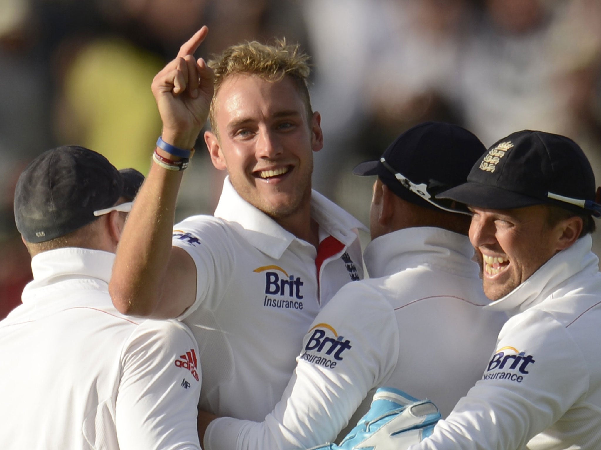 Stuart Broad is congratulated following the dismissal of Brad Haddin