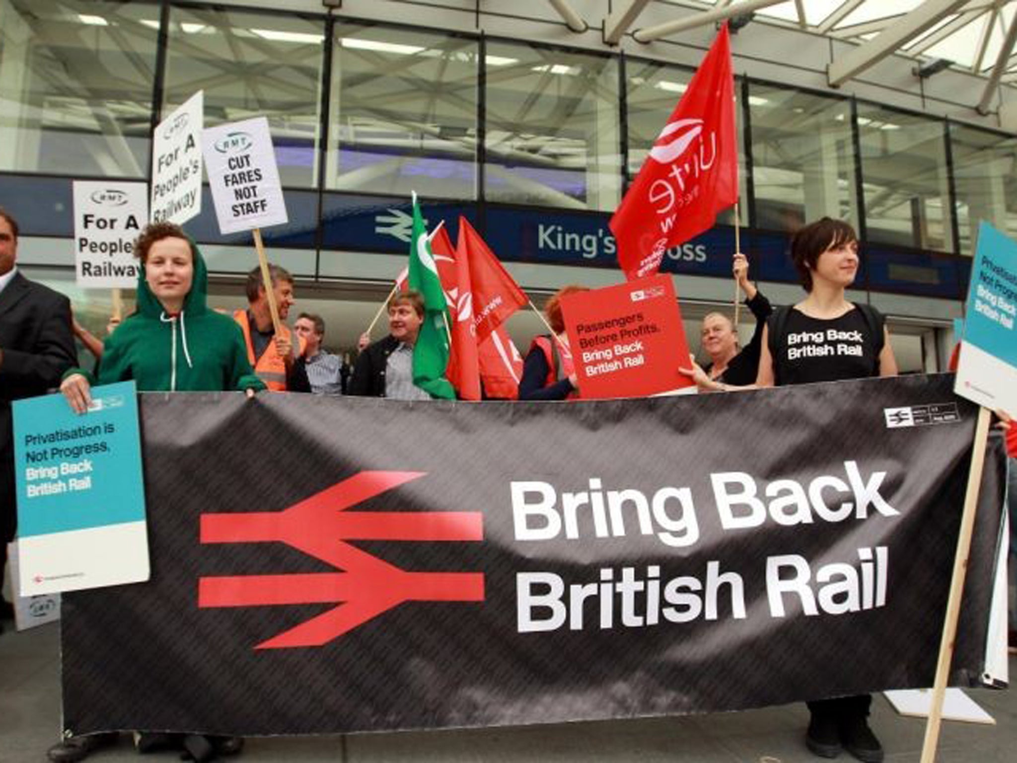 The Action for Rail campaign group protest over rail fares, outside Kings Cross Station in London