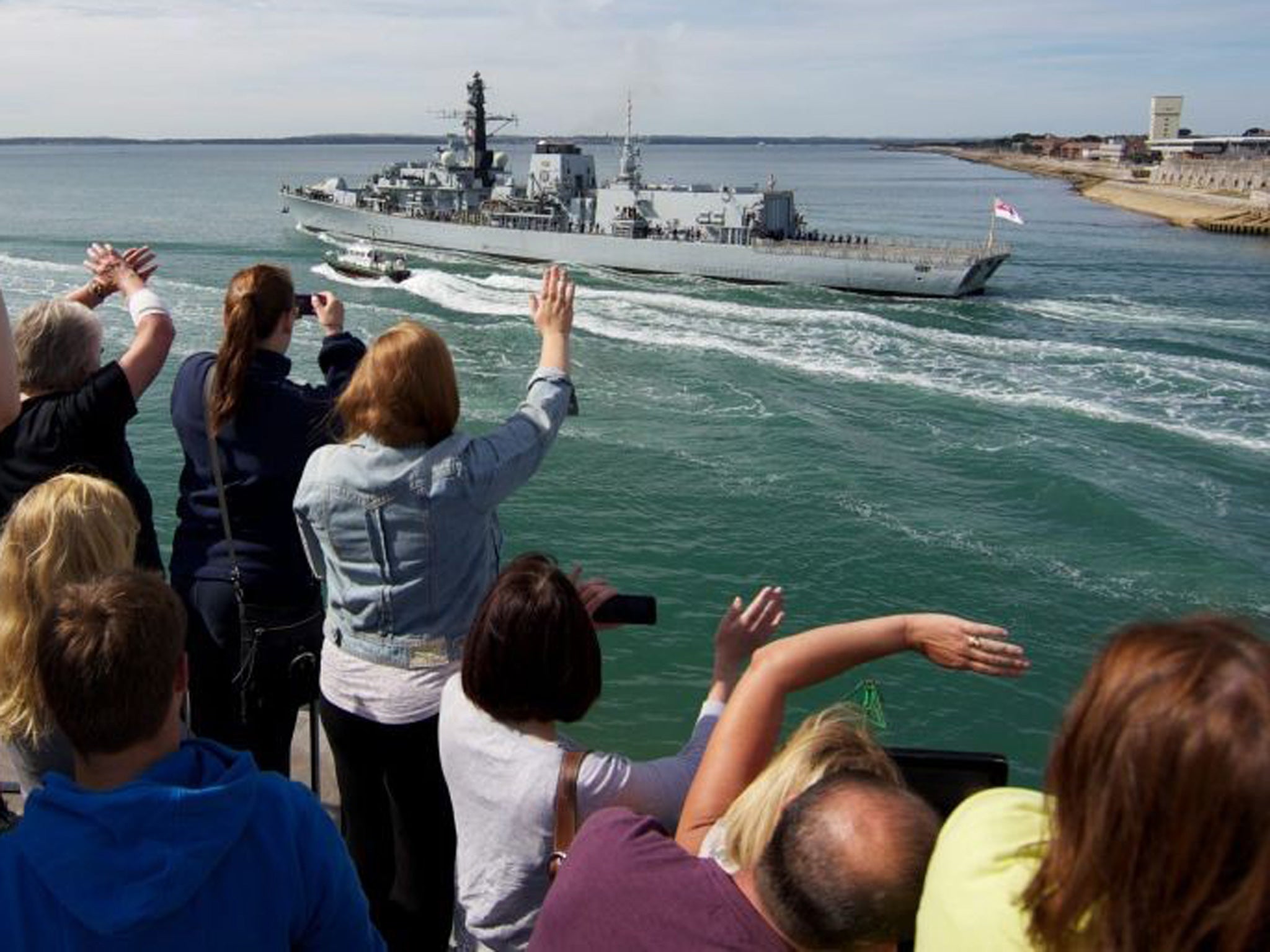 Well wishers wave as HMS Westminster sails from Portsmouth as part of an annual deployment of RN, Royal Marines and Royal Fleet Auxiliary personnel to the Mediterranean and Gulf region. The warship will visit Gibraltar on its way