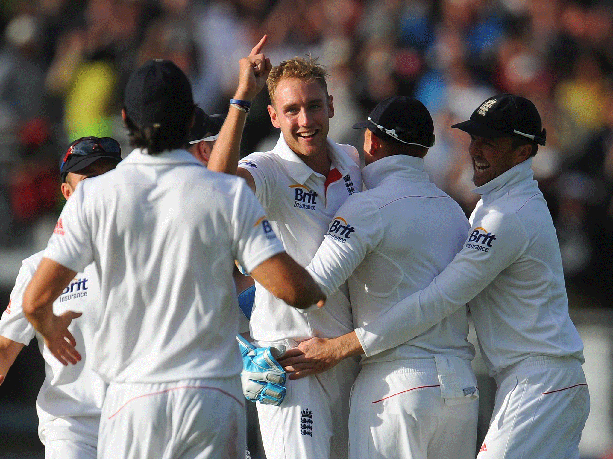 Stuart Broad is congratulated following the dismissal of Brad Haddin