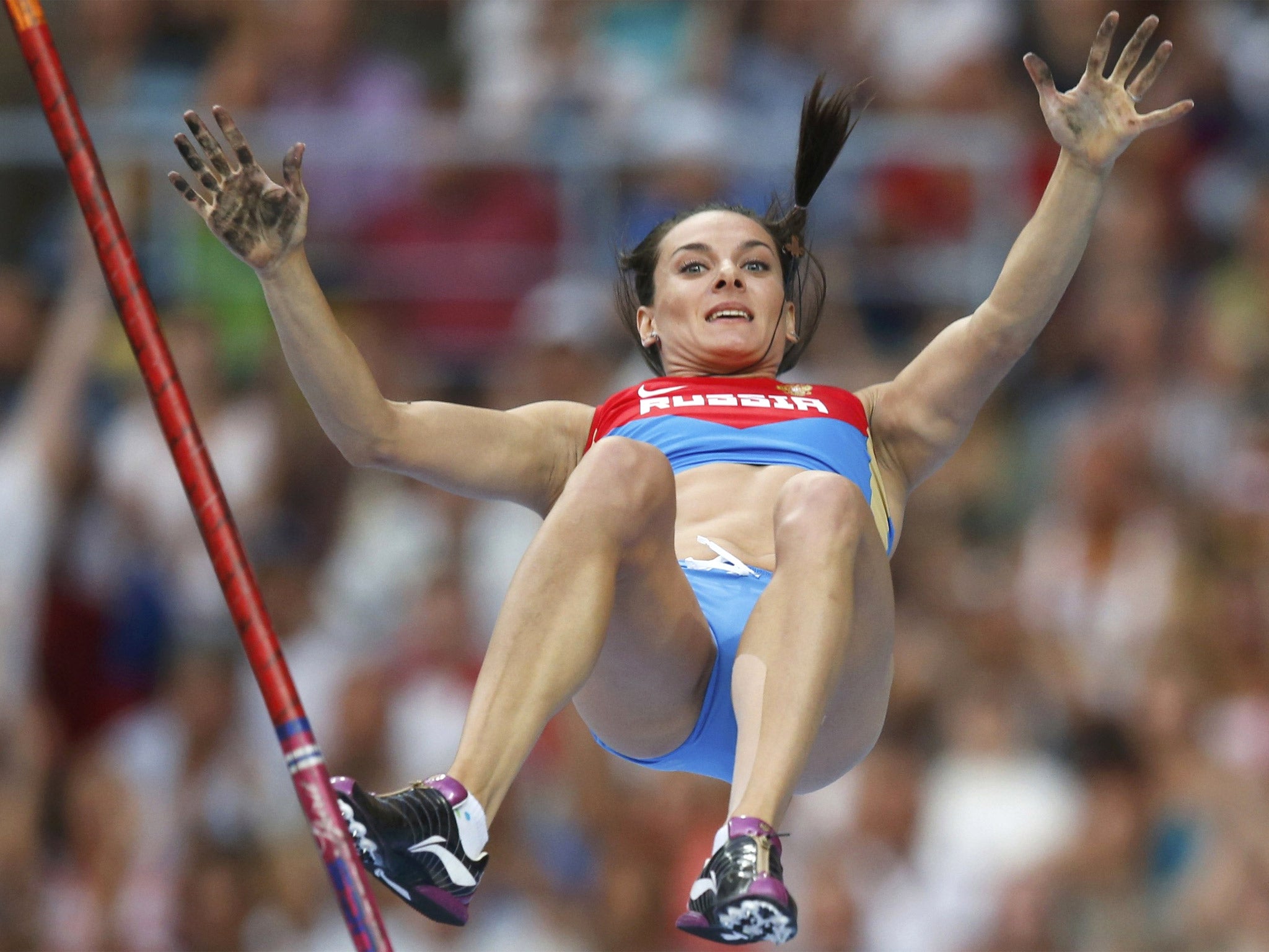 Yelena Isinbayeva claims victory in the pole vault final