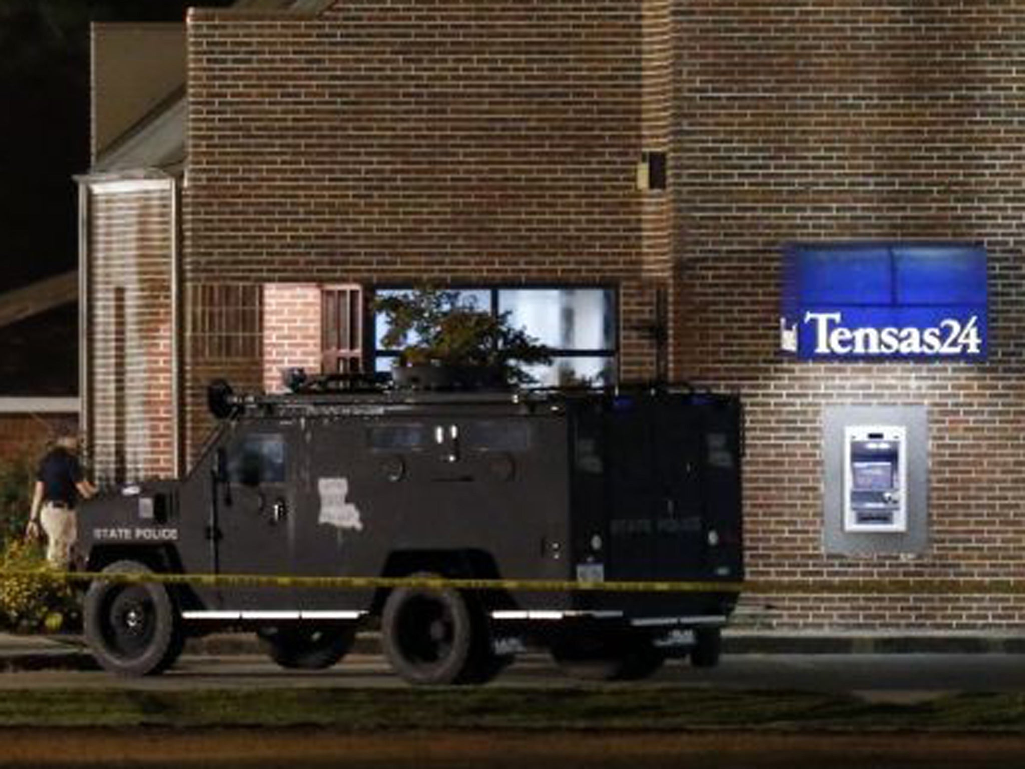 A SWAT vehicle outside the Tensas State Bank in St. Joseph as investigators work throughout the early morning hours