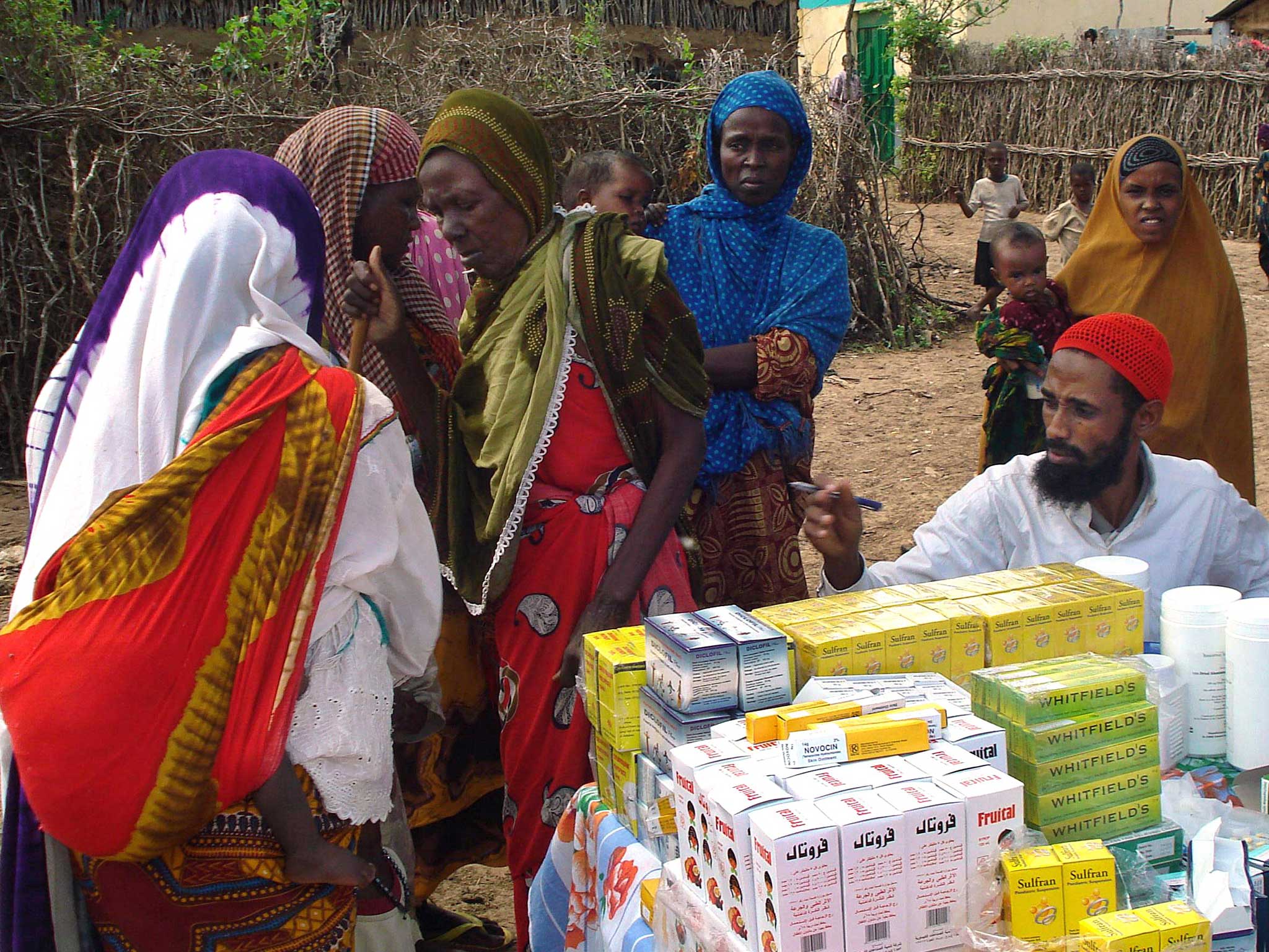 Somali women and children waiting to get medicine at a Medecins Sans Frontieres (Doctors Without Borders) medical clinic in the lower Shabelle region