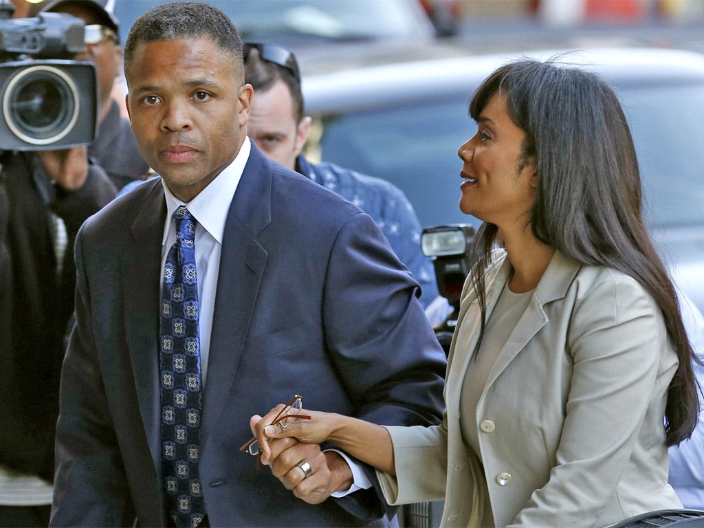 Jesse Jackson Jr and his wife Sandi arrive in court