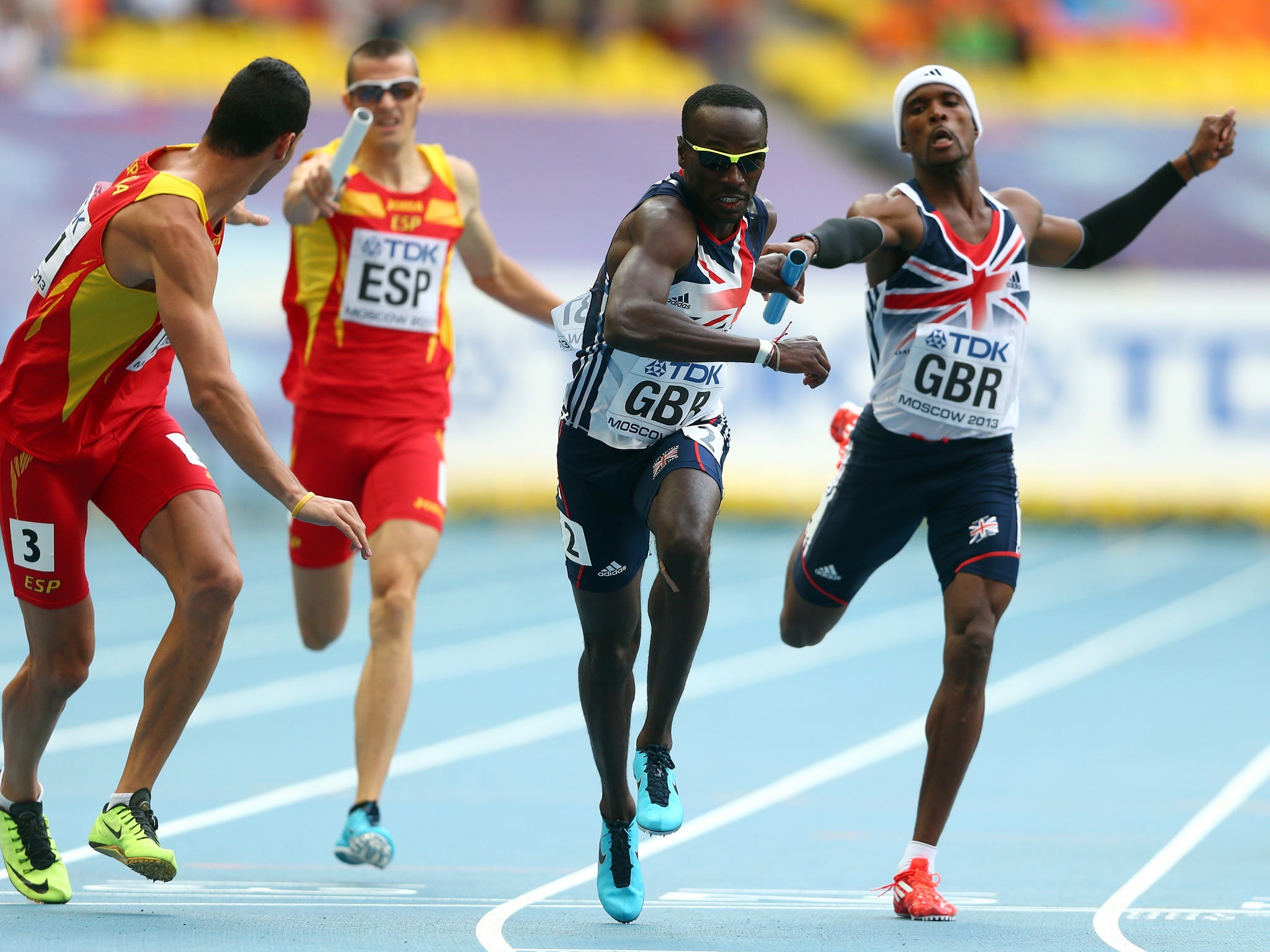 Conrad Williams of Great Britain hands over to Michael Bingham