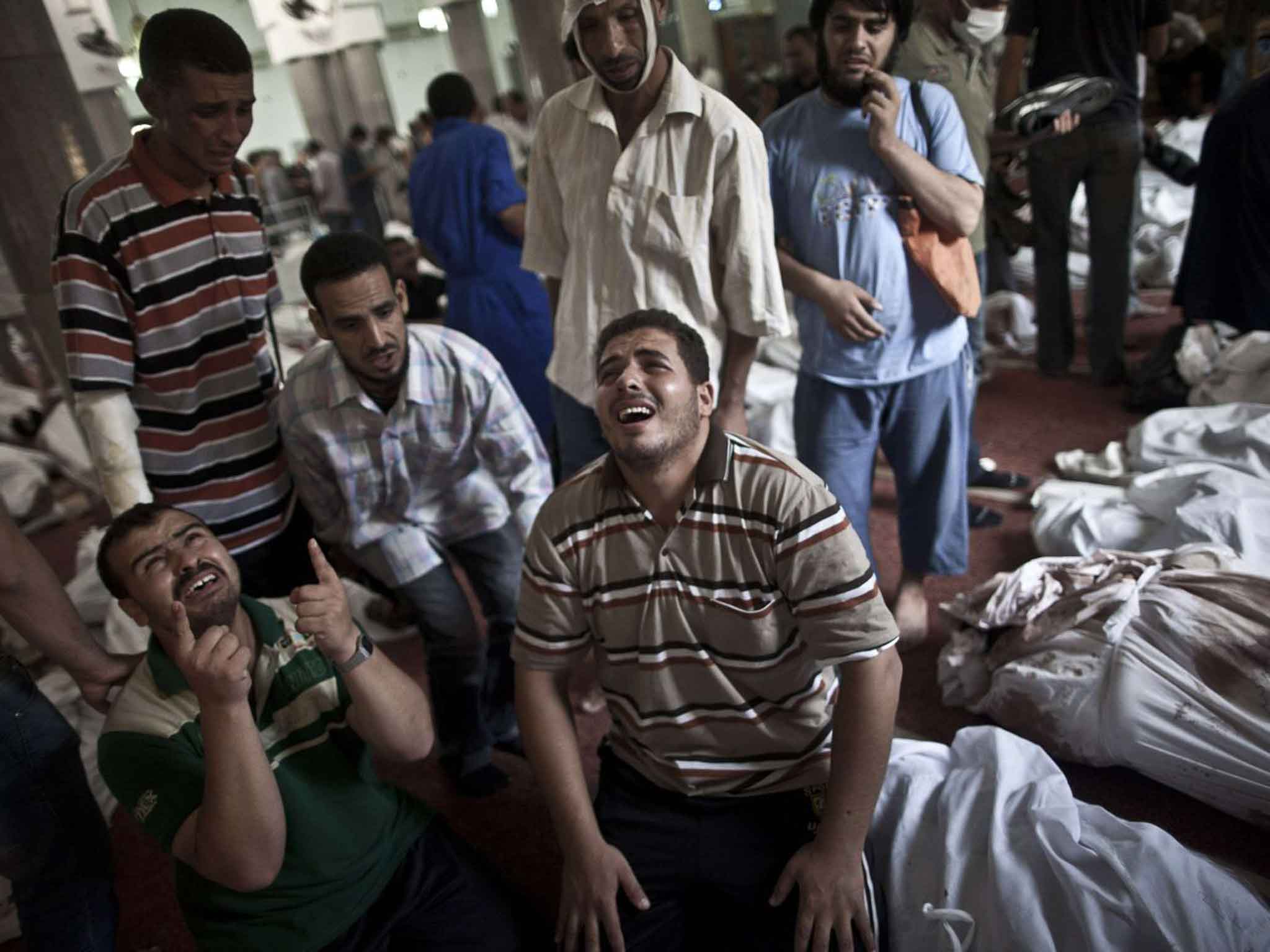 Relatives mourning their dead