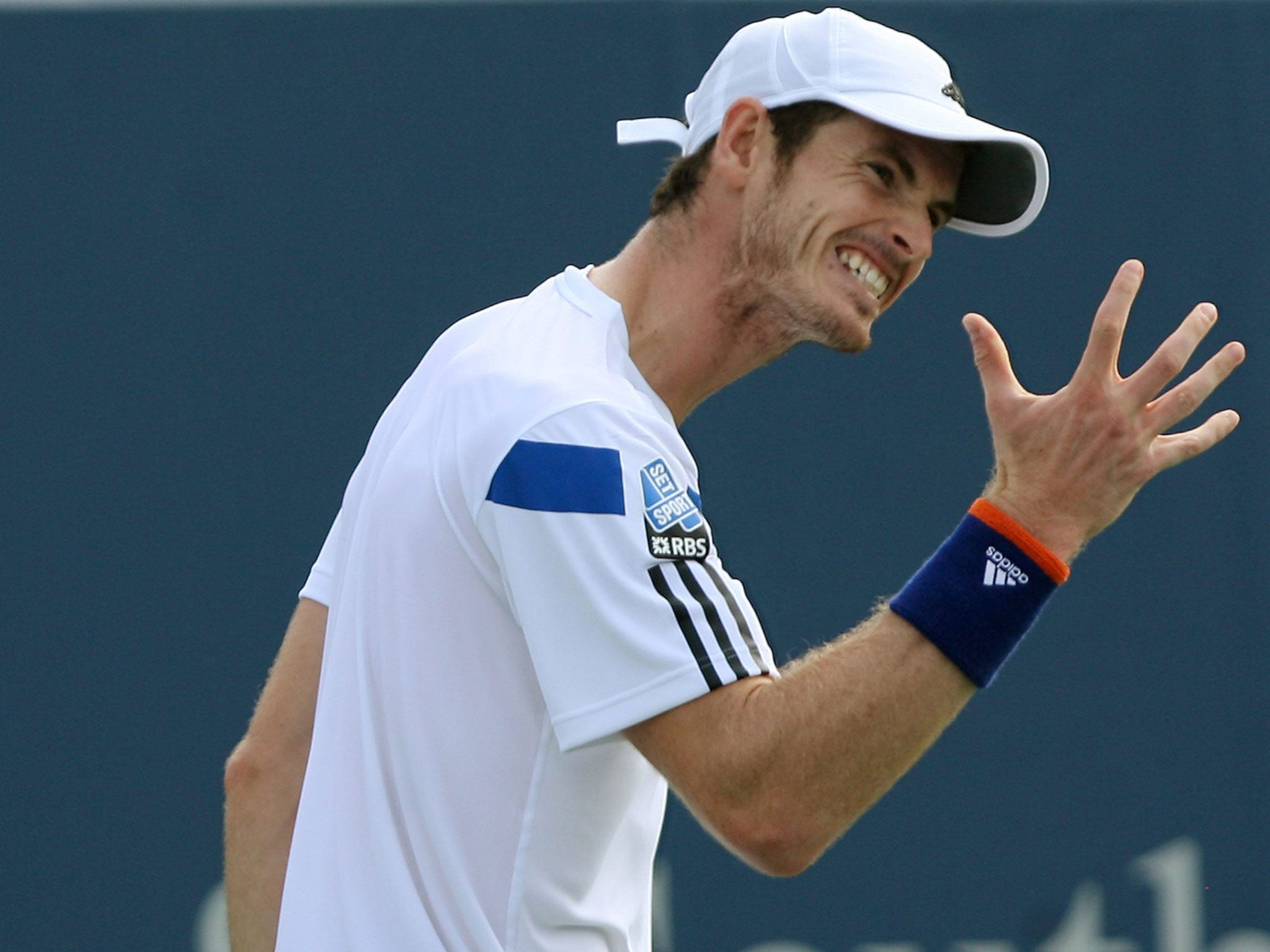 Off hand: A frustrated Andy Murray during his defeat to Tomas Berdych