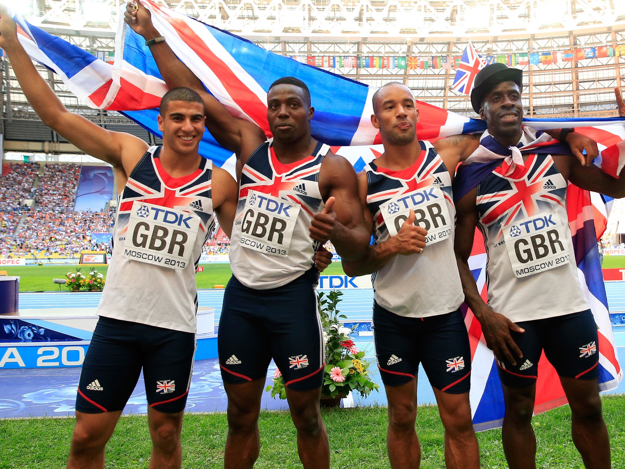 The Great Britain 4x100m relay team of (left to right) Adam Gemili, Harry Aikines-Aryeetey, James Ellington, and Dwain Chambers celebrate their bronze - but they were soon notified of their illegal changeover