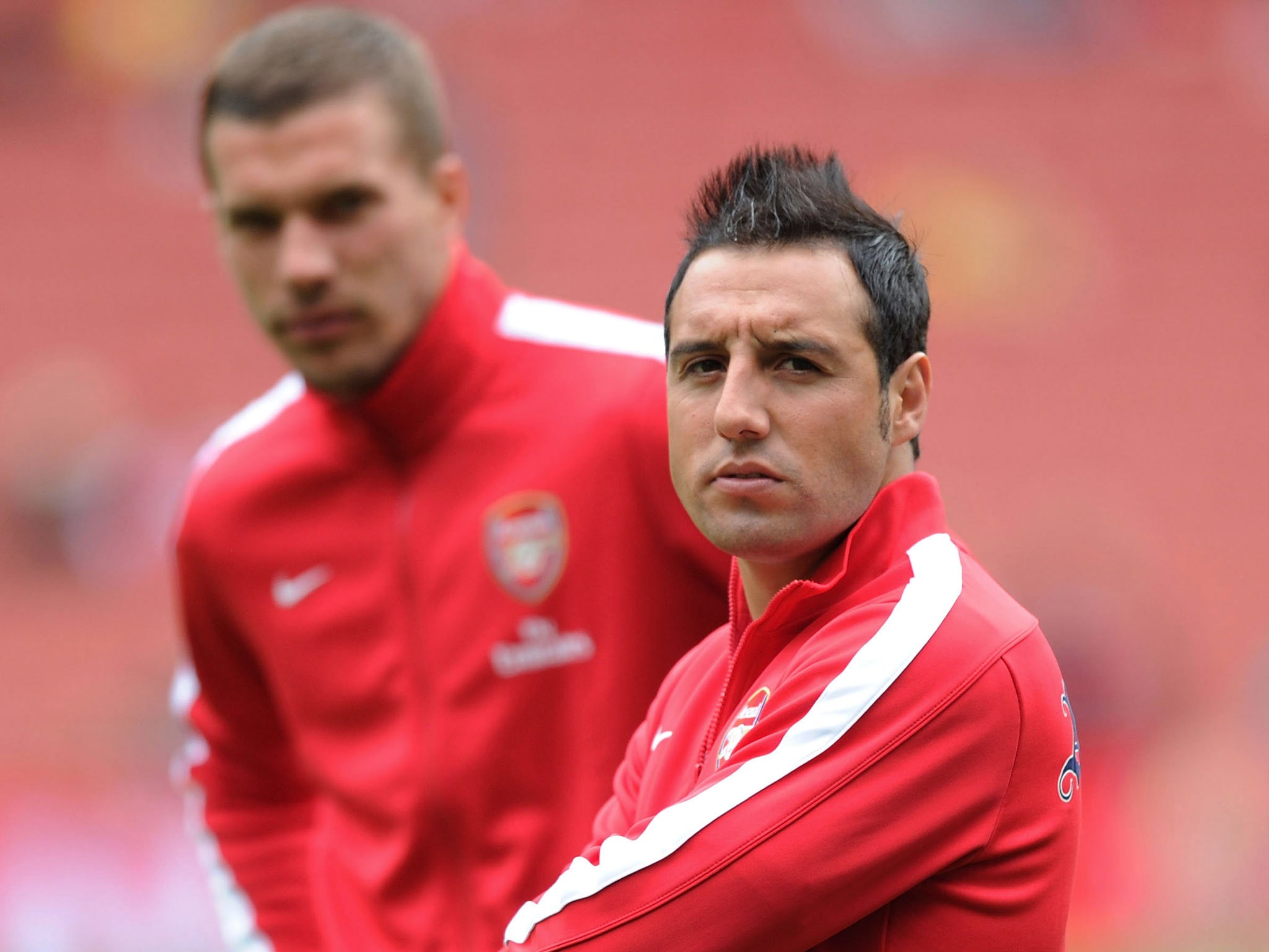 Santi Cazorla and Lukas Podolski