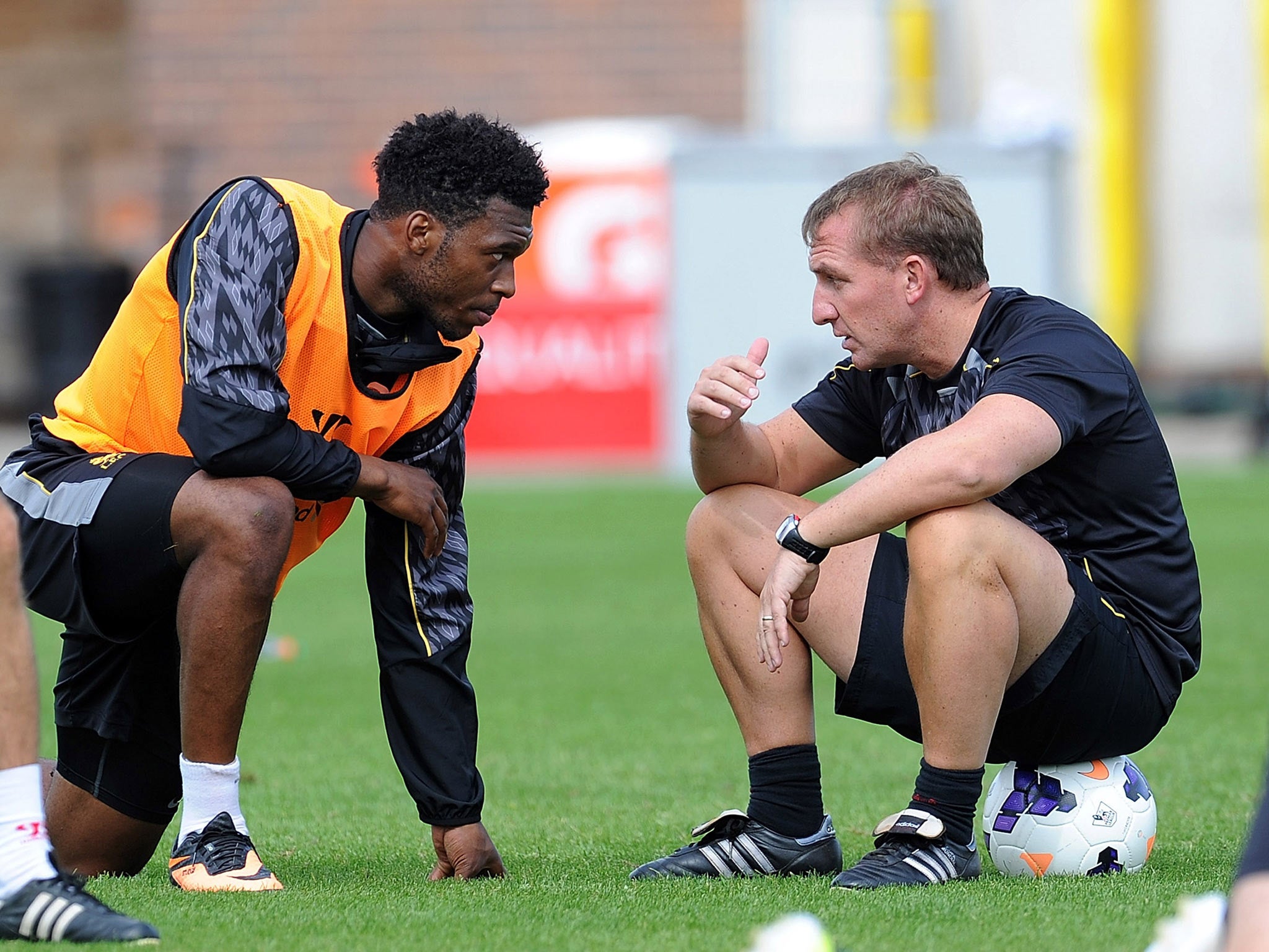 Brendan Rodgers talks with Daniel Sturridge