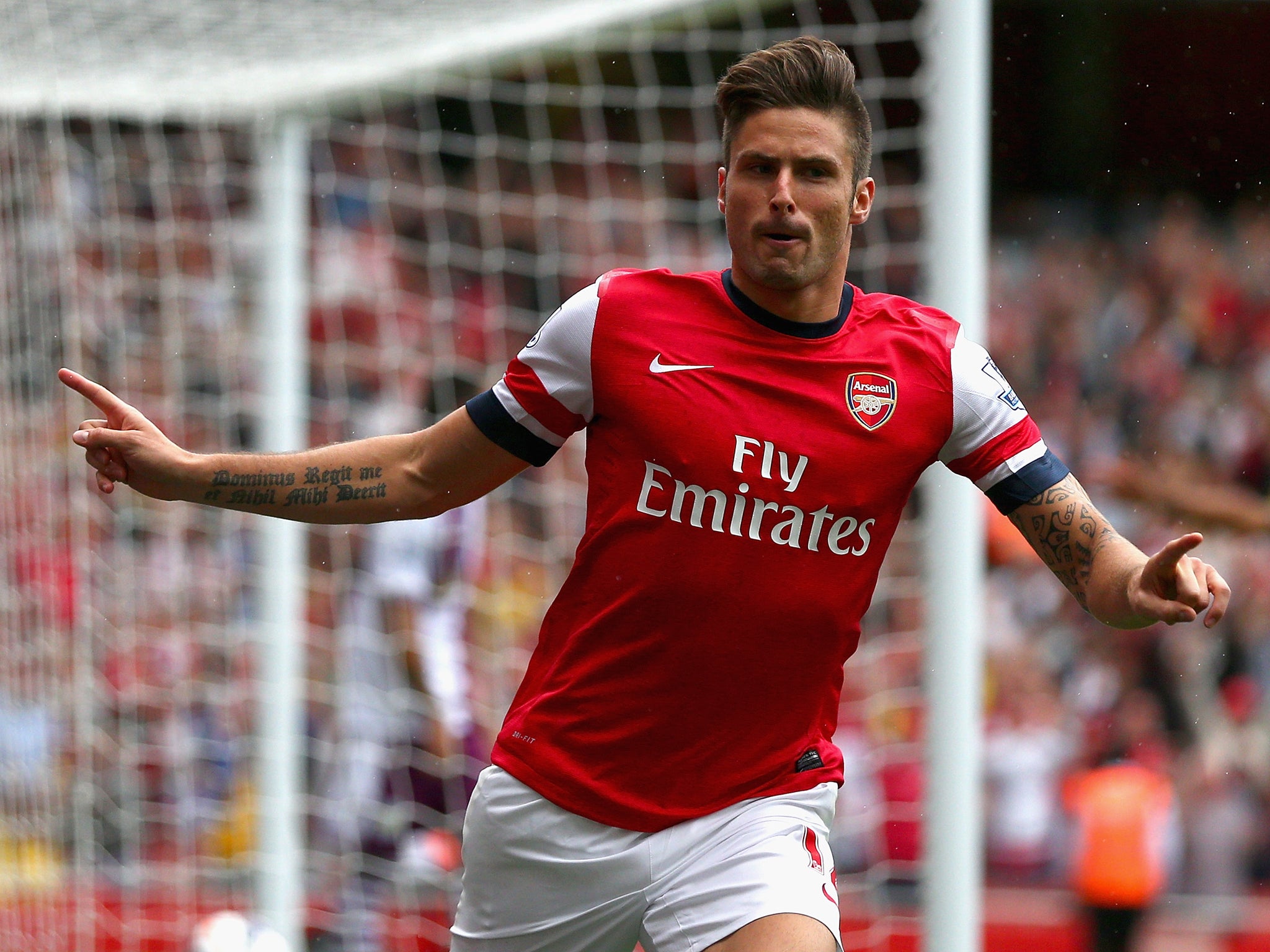 Olivier Giroud celebrates his goal against Aston Villa