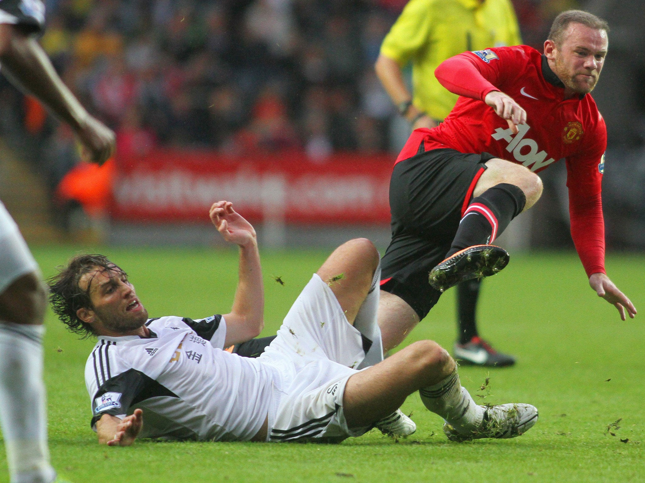 Wayne Rooney in action for Manchester United on Saturday, against Swansea City's Michu