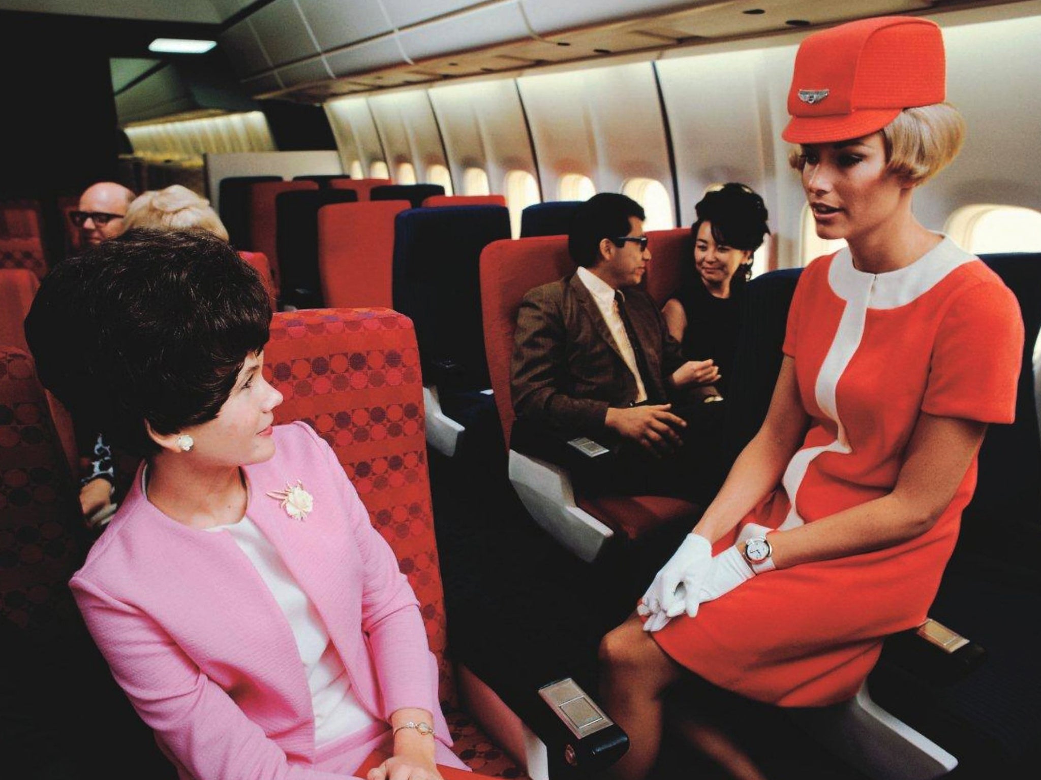 United Airlines stewardess in a simulated cabin of a Douglas DC-10, 1968