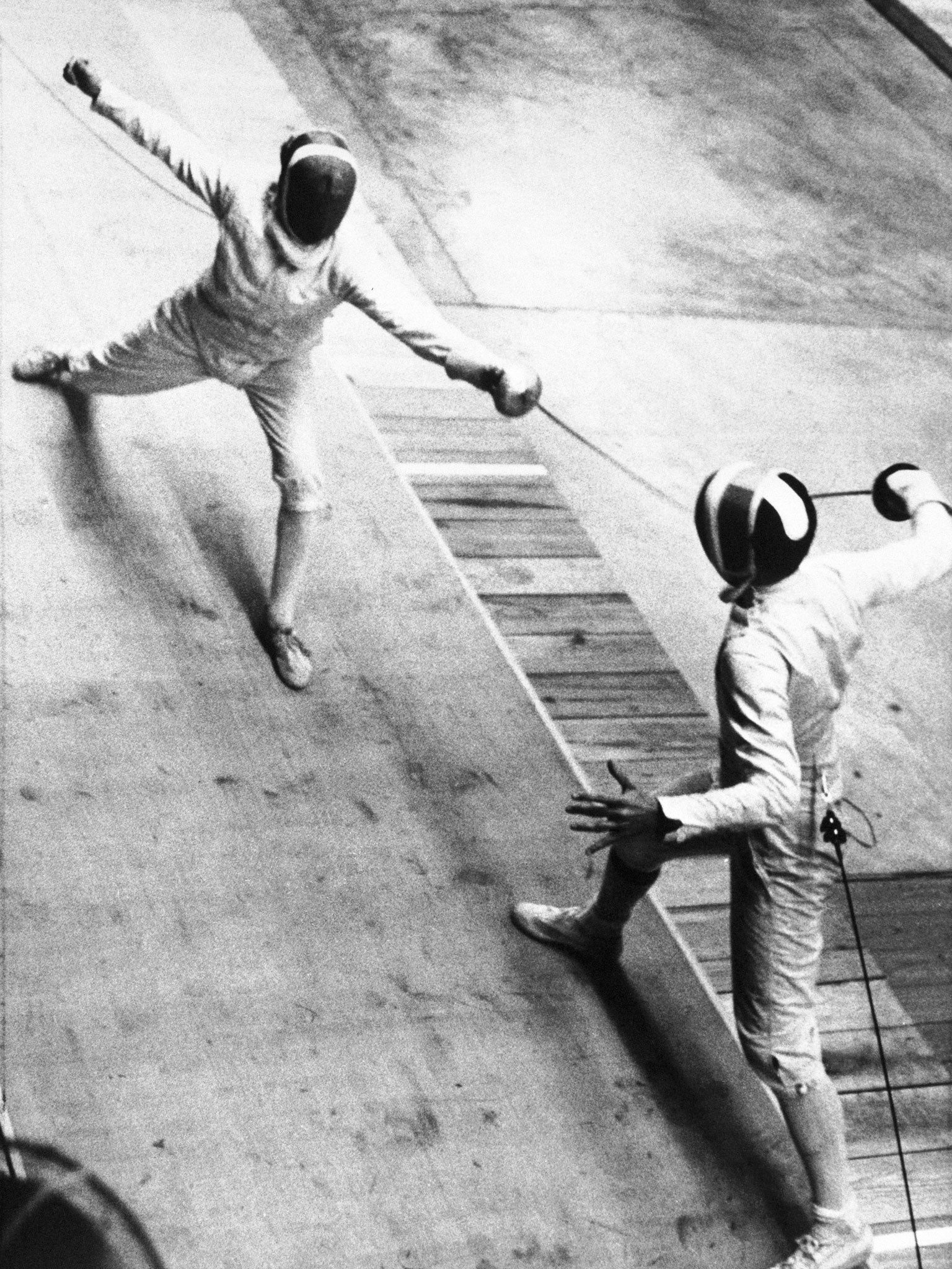 Hoskyns, left, scores a point against Ireland's John Pelling in 1966