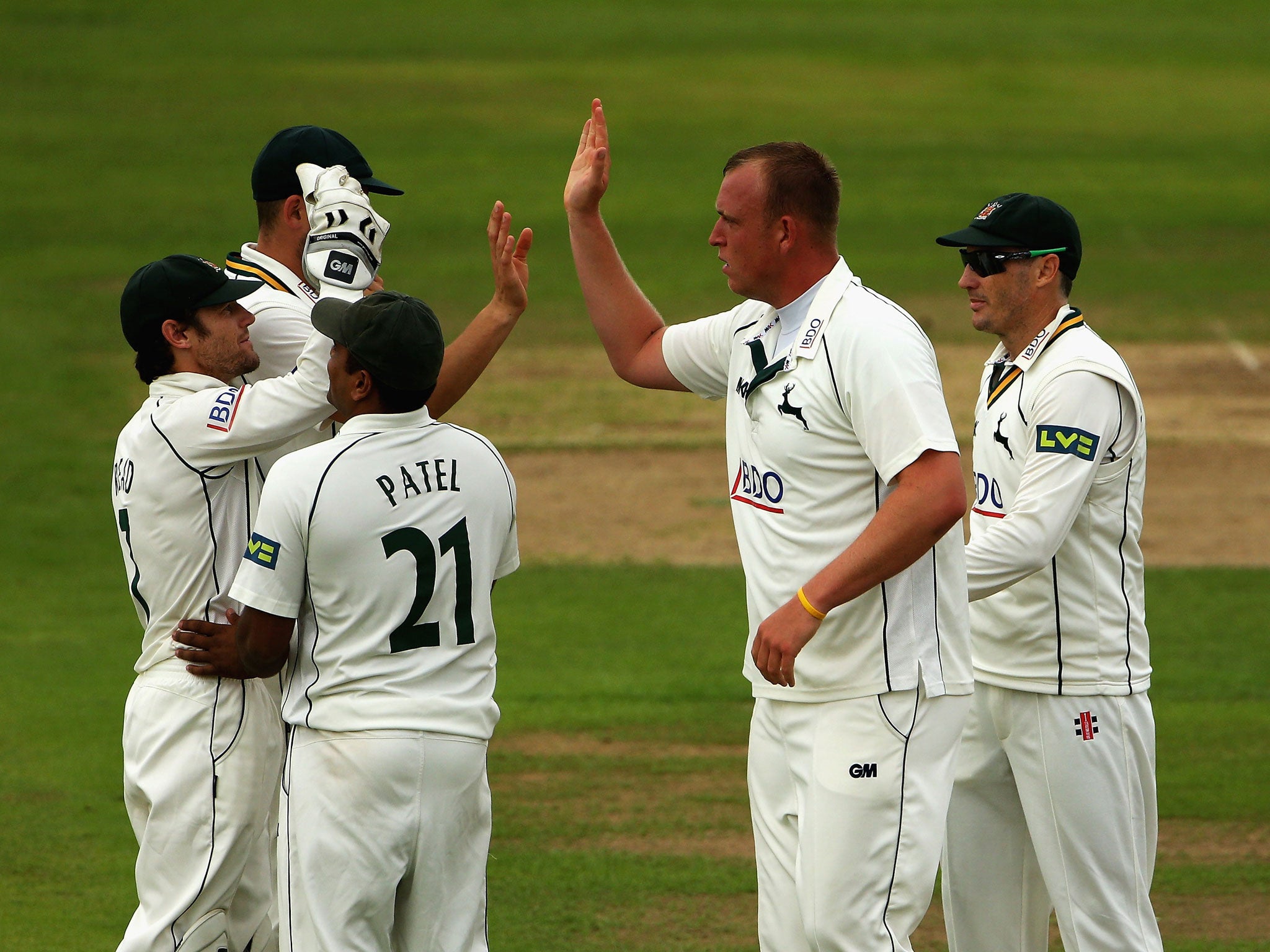 Luke Fletcher celebrates after taking the wicket of Phil Jacques