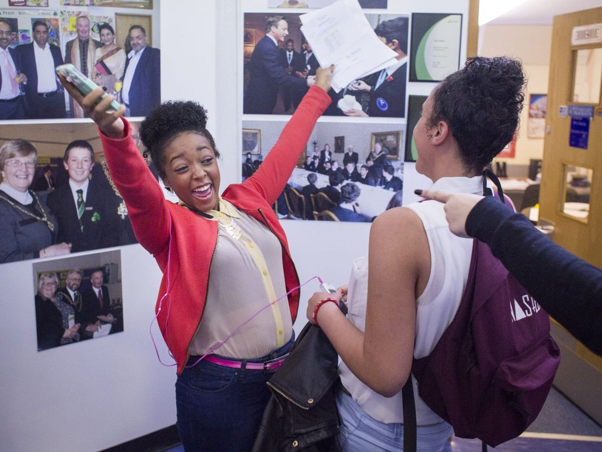 Louise Francis celebrates her five A* and 4 A grade GCSEs at Perry Beeches School in Birmingham