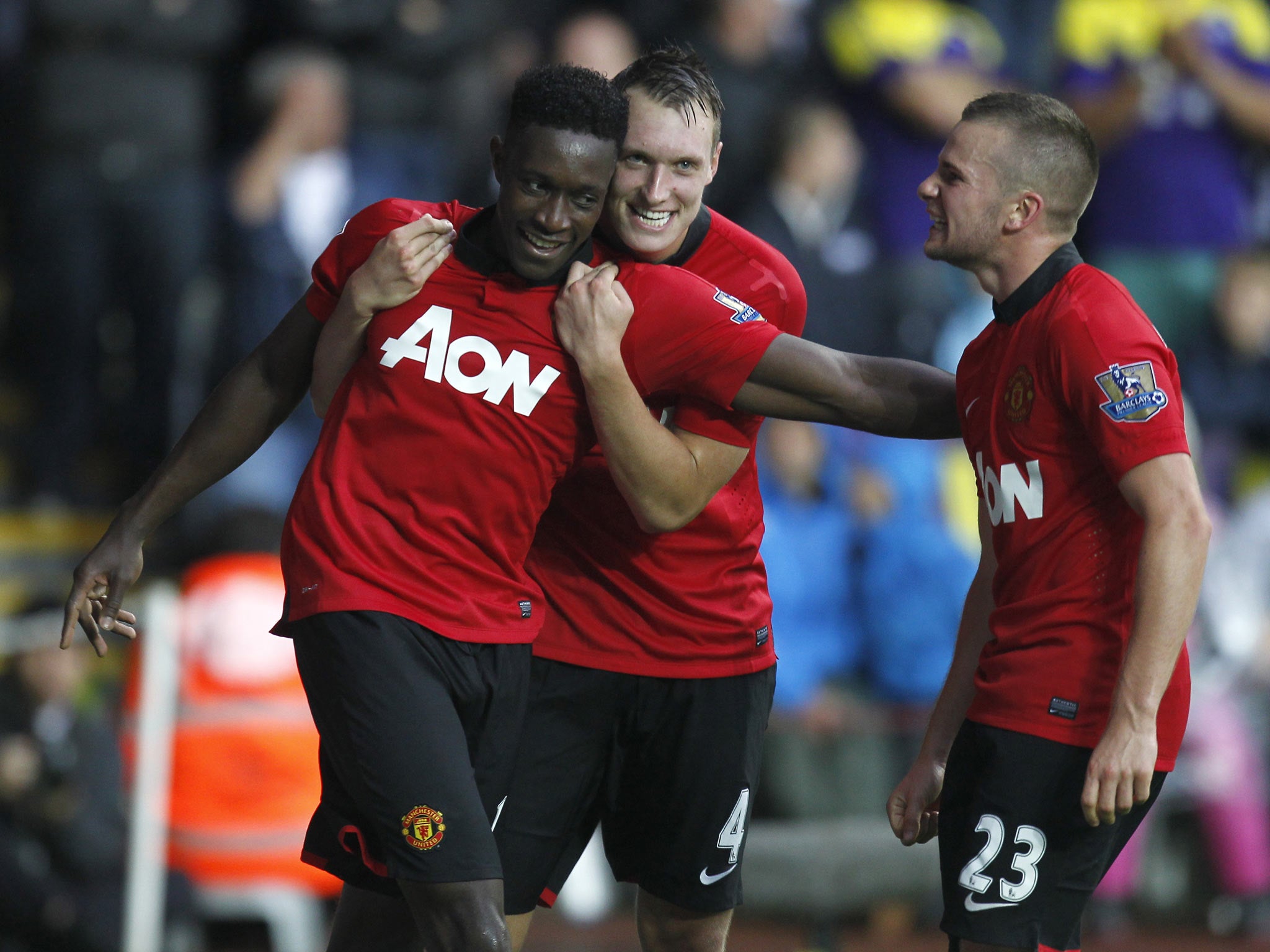 Danny Welbeck celebrates a goal against Swansea