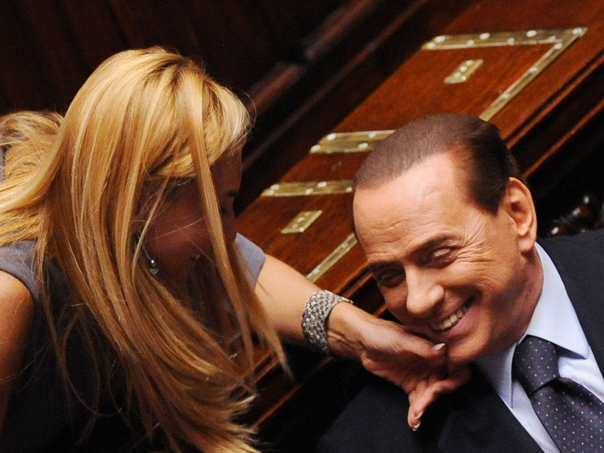 Michaela Biancofiore, left, with Silvio Berlusconi, right