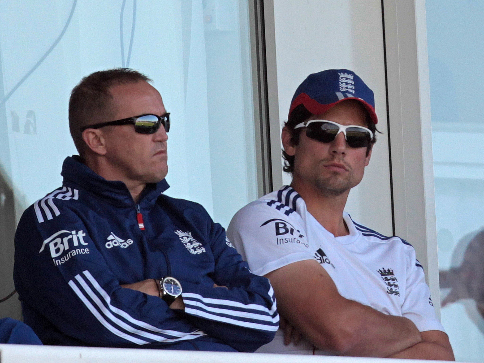 England’s Andy Flower, left, and Alastair Cook, right, have much to consider