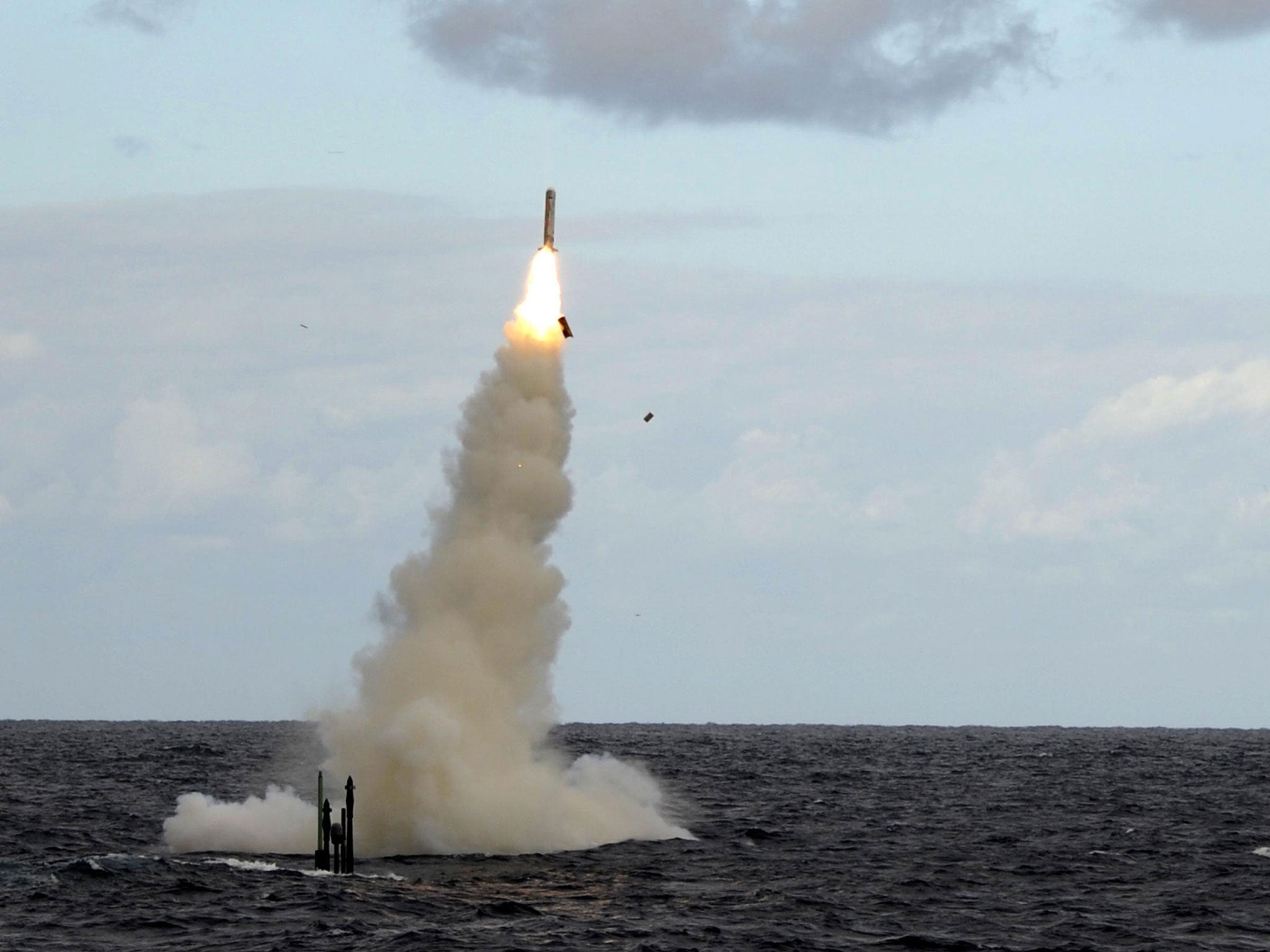 A Royal Navy submarine test fires a Tomahawk missile