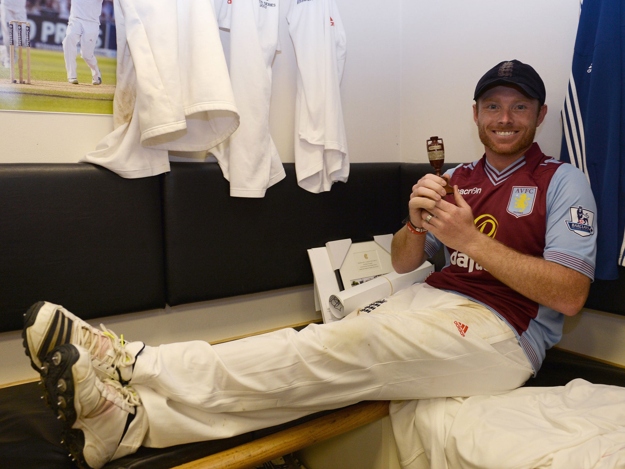 How happy can you get? The urn in my hand and a Villa shirt on my back