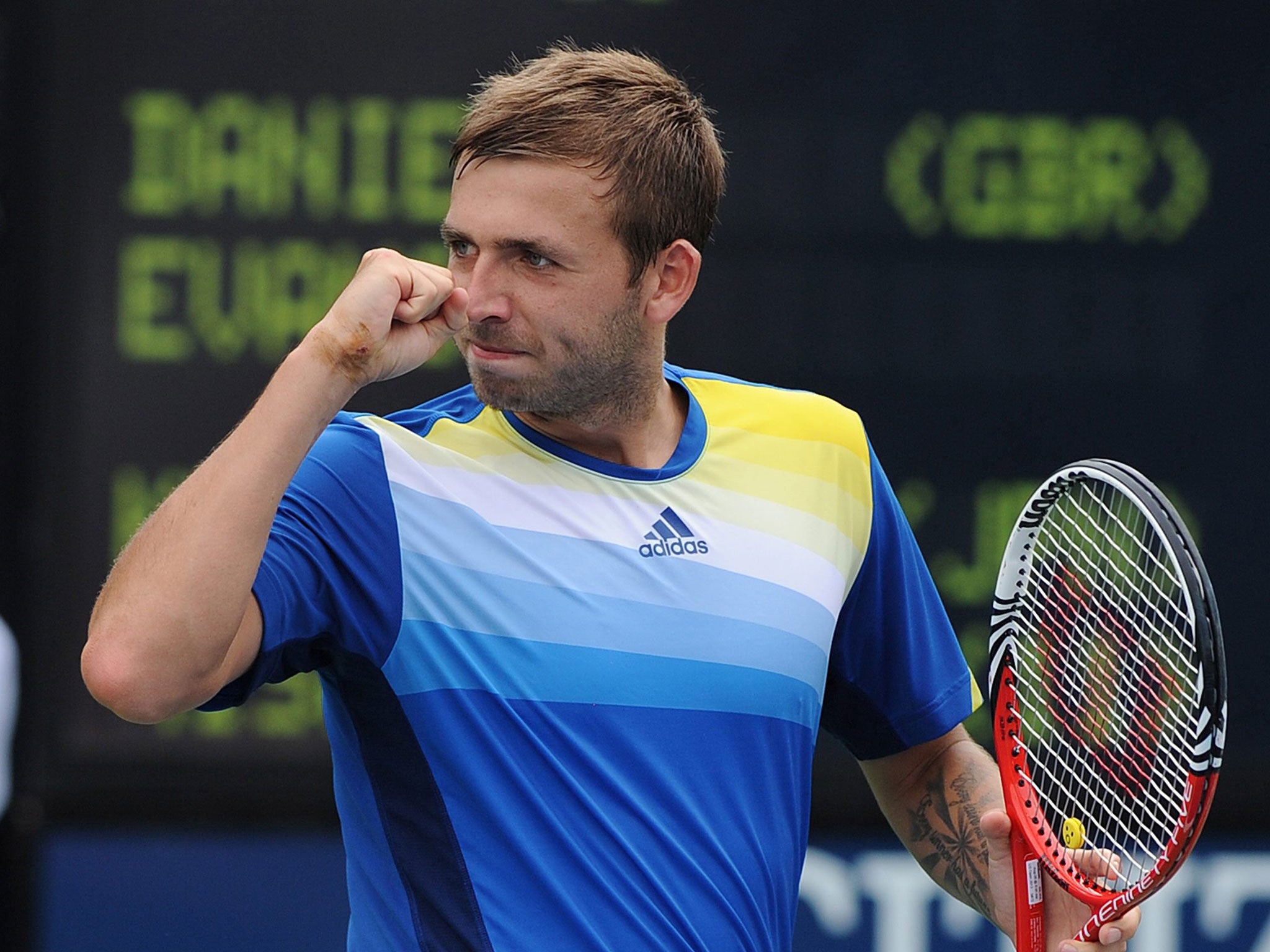 Dan Evans celebrates beating world No 12 Kei Nishikori