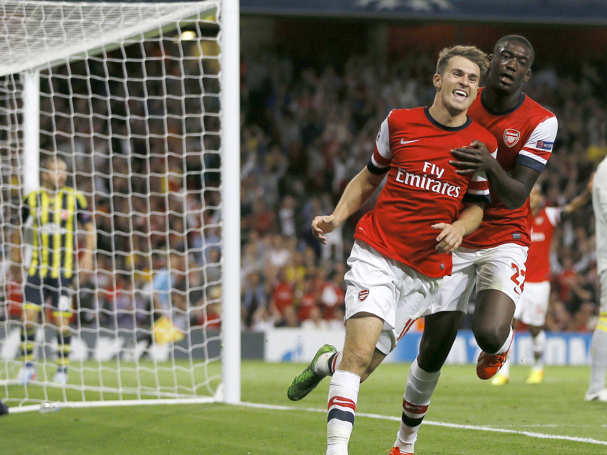 Aaron Ramsey, left, celebrates his second goal