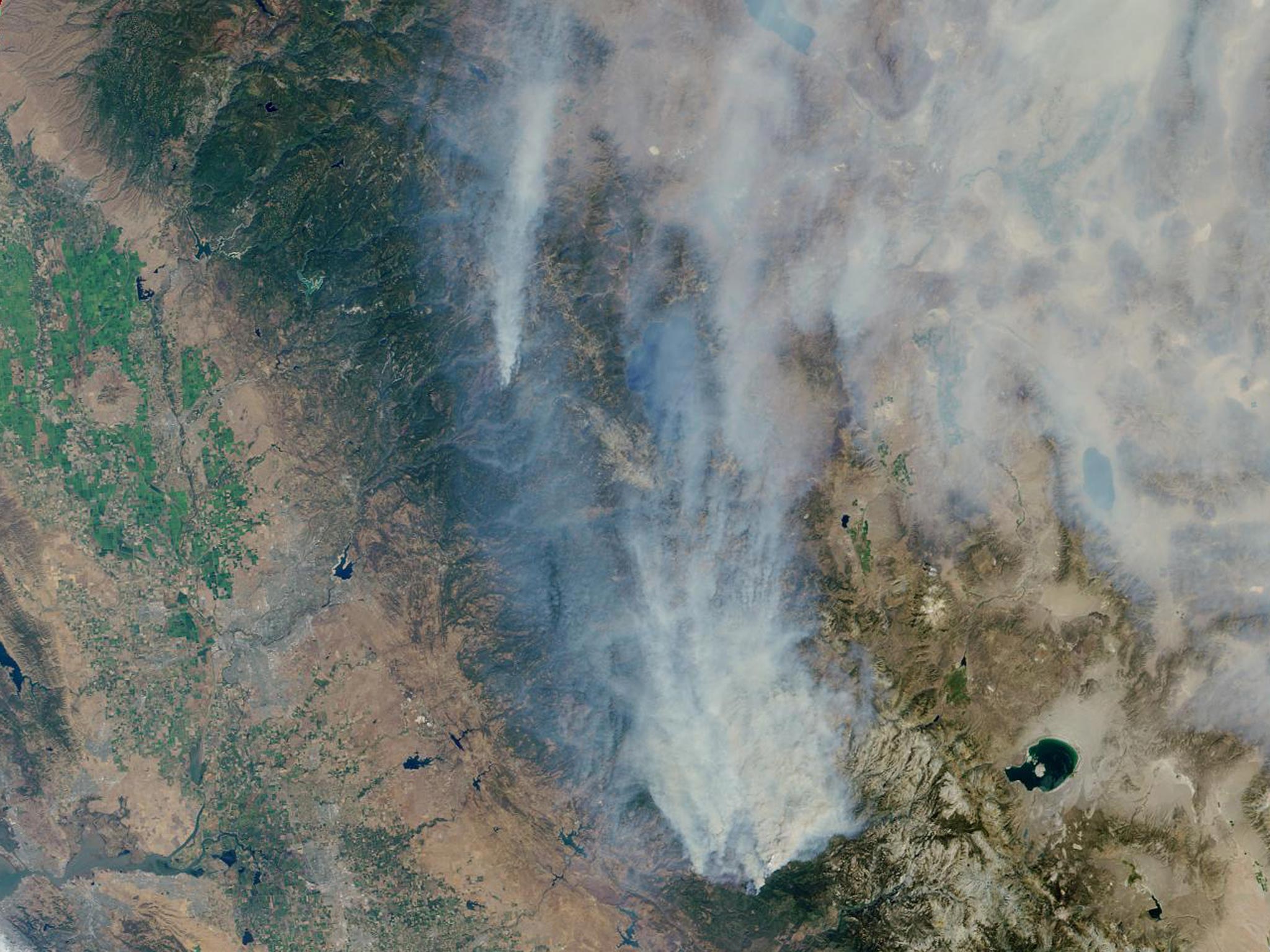 This visible image of California's Rim Fire was acquired by the Multi-angle Imaging SpectroRadiometer (MISR) instrument on NASA's Terra spacecraft, showing extensive, brownish smoke. The imaged area measures 236 by 215 miles (380 by 346 kilometers).