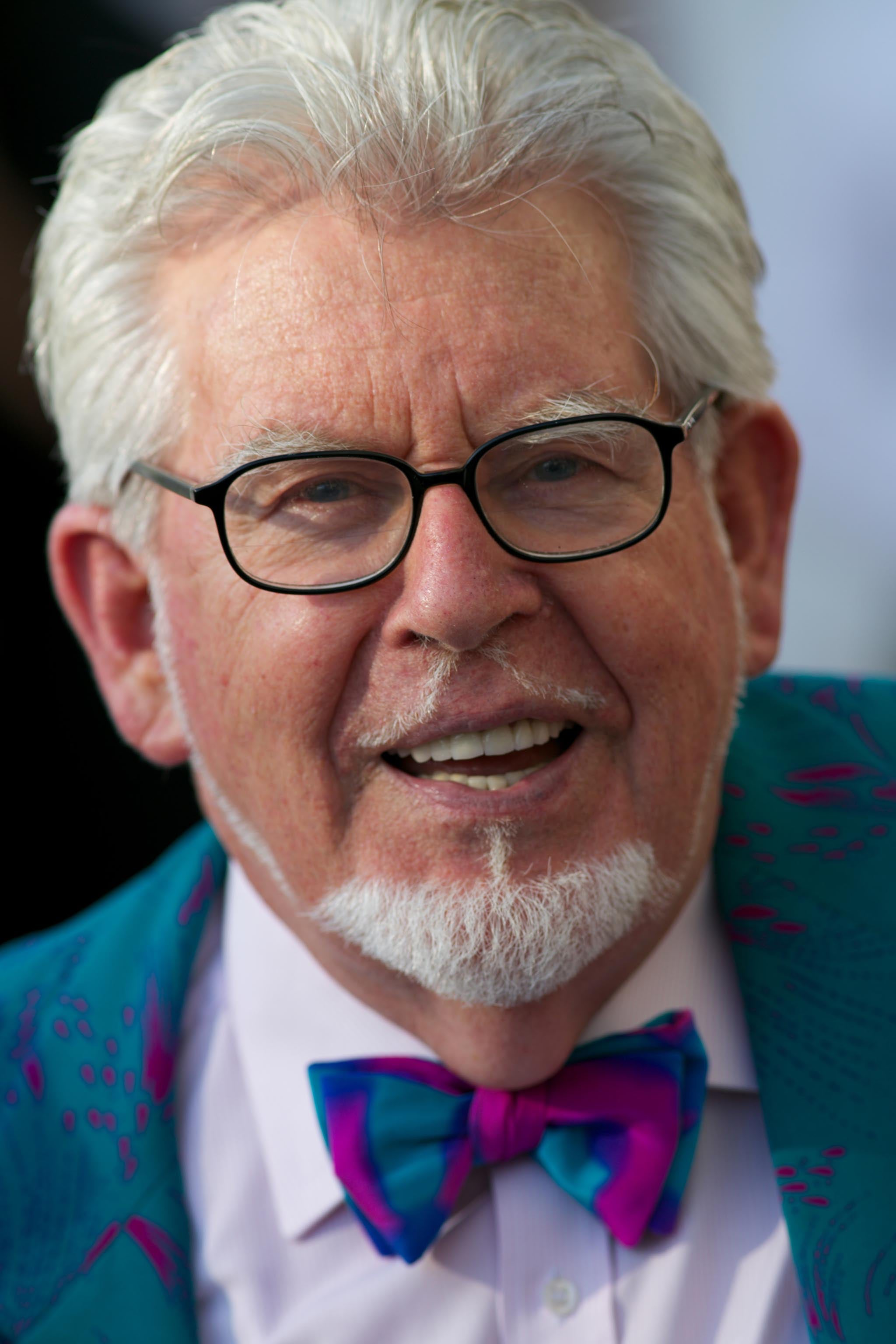 Rolf Harris arrives at the 2012 Bafta awards