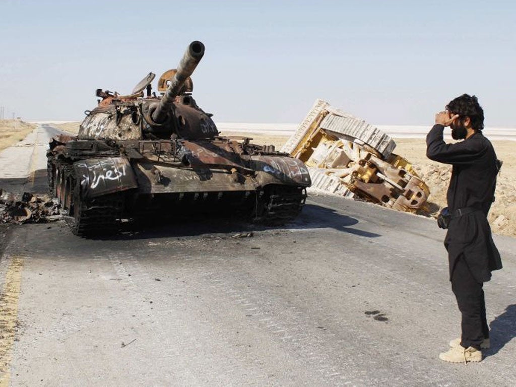 A Free Syrian Army fighter in Khanasir, near Aleppo, yesterday