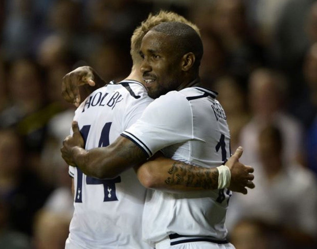 Jermain Defoe (right) celebrates scoring for Spurs last night