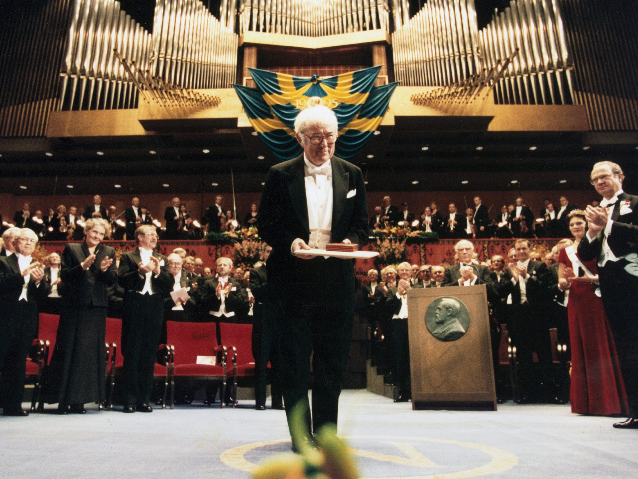 Seamus Heaney poses with the Nobel Prize for Literature