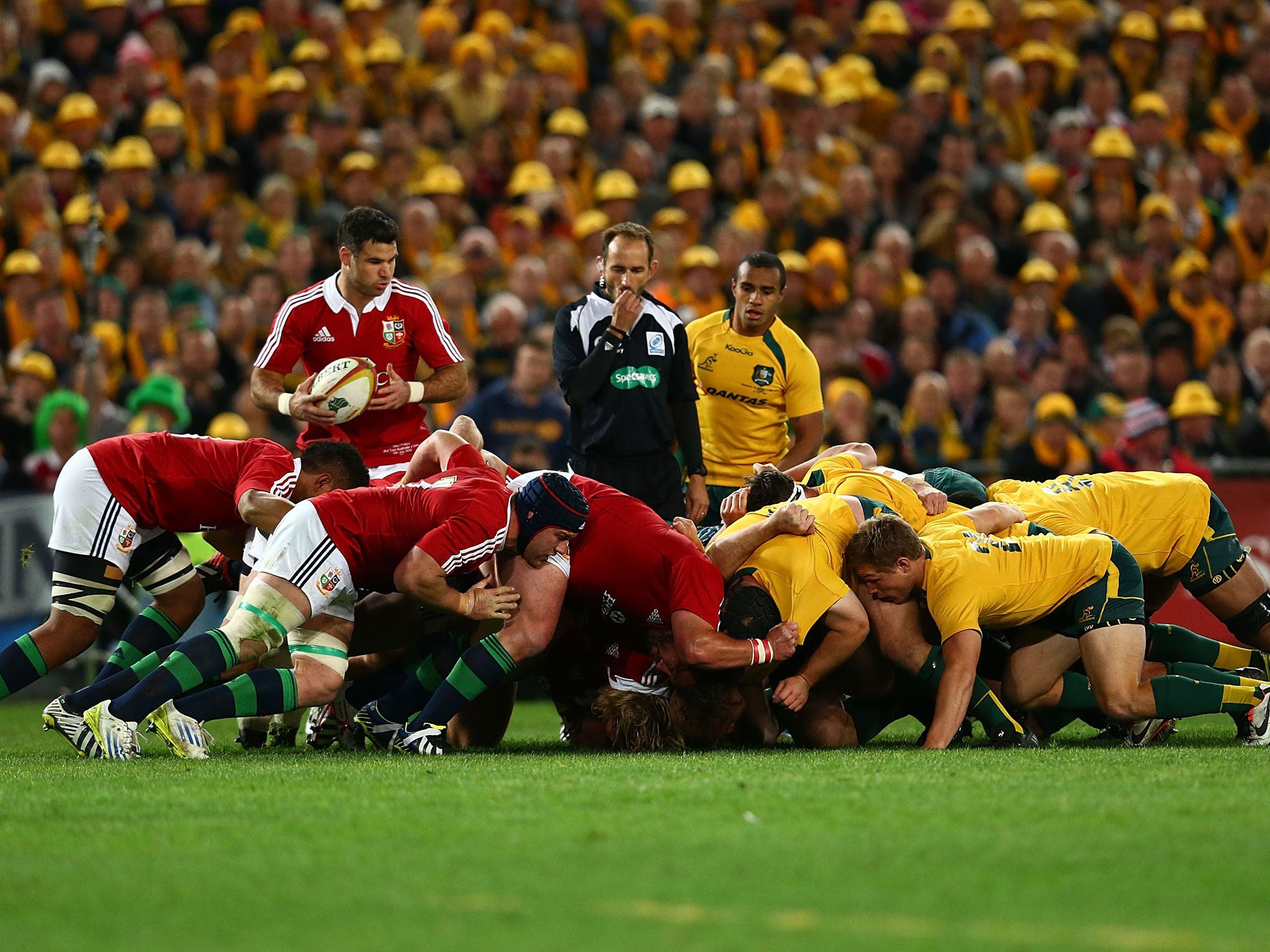 The referee blows as a scrum collapses during the Lions tour to Australia in June