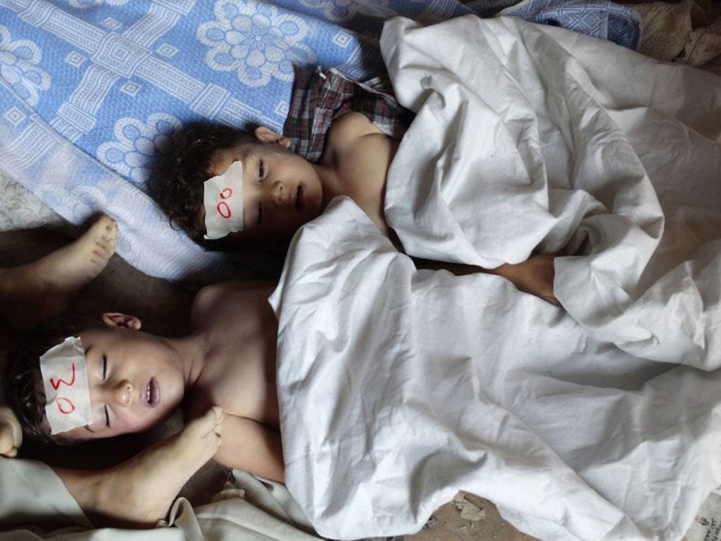 The bodies of Syrian children killed in a gas attack on 21 August