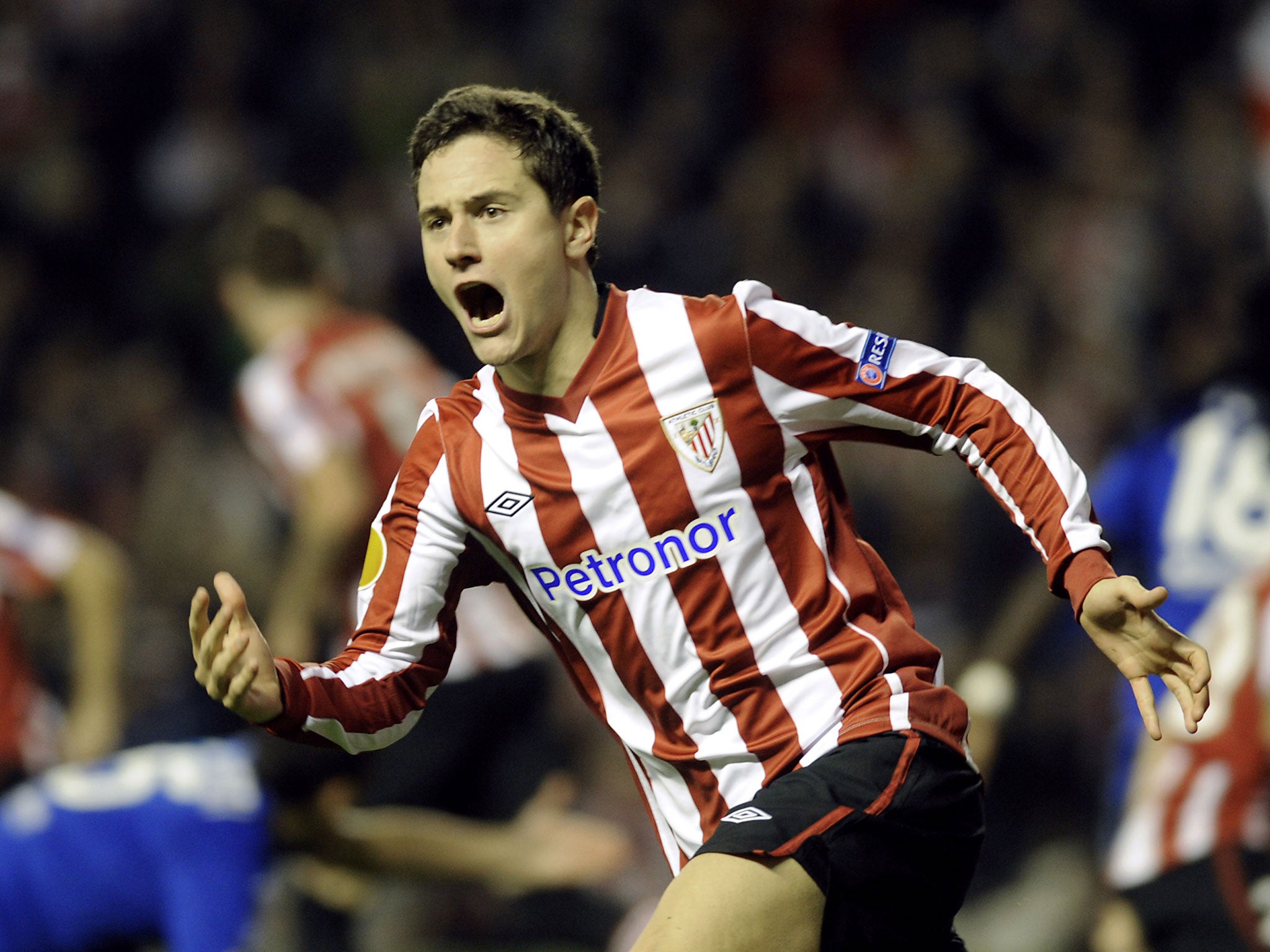 Athletic Bilbao's midfielder Ander Herrera gestures after scoring his team's first goal